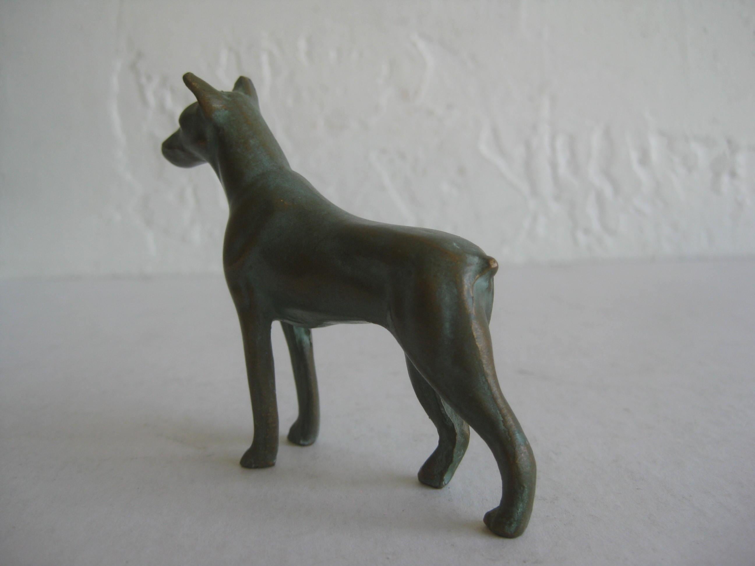 concrete doberman statue