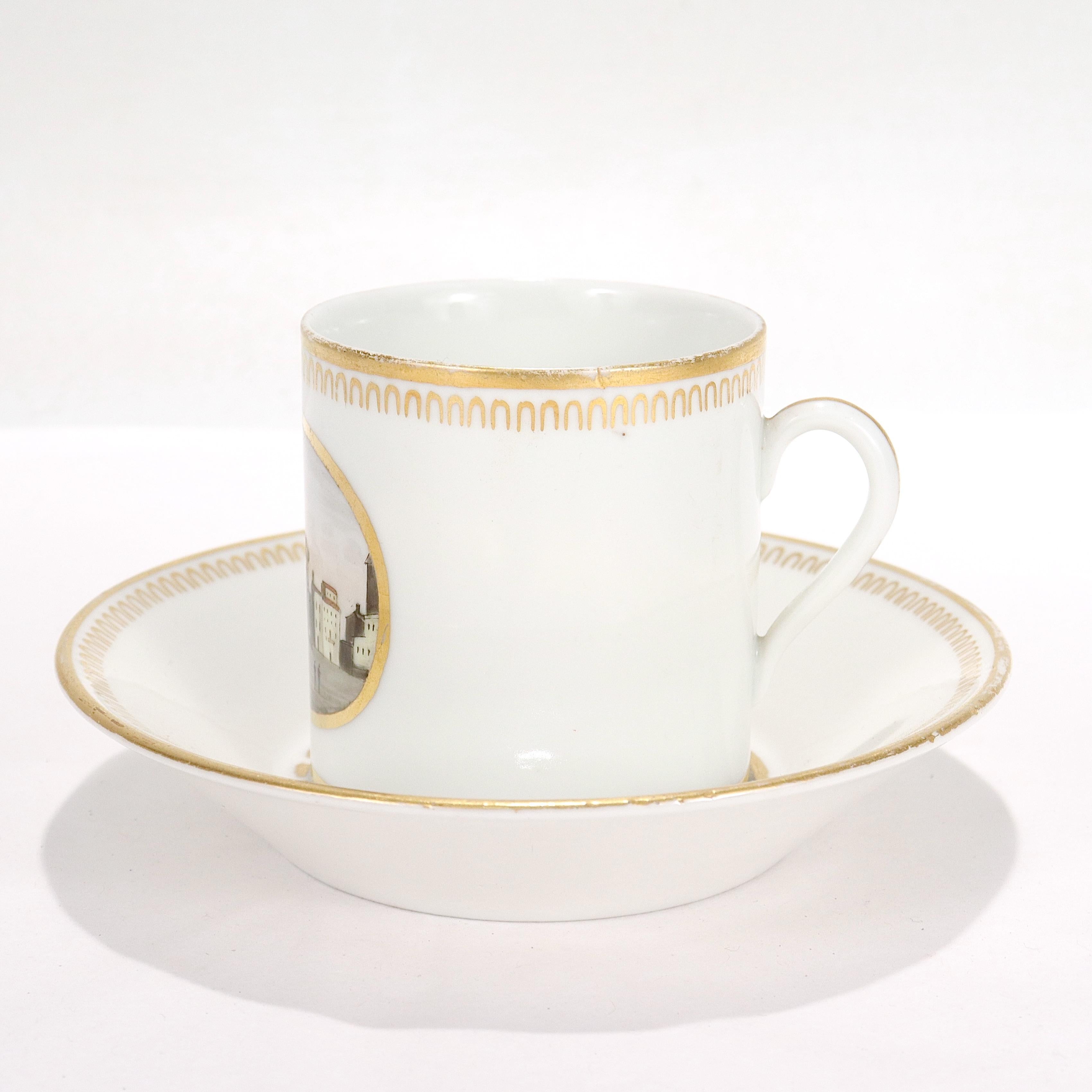 Nous vous proposons une tasse et une soucoupe anciennes en porcelaine topographique.

Fabrique de porcelaine Doccia, vers 1820.

Avec des scènes topographiques en émail peint : la tasse représentant la 