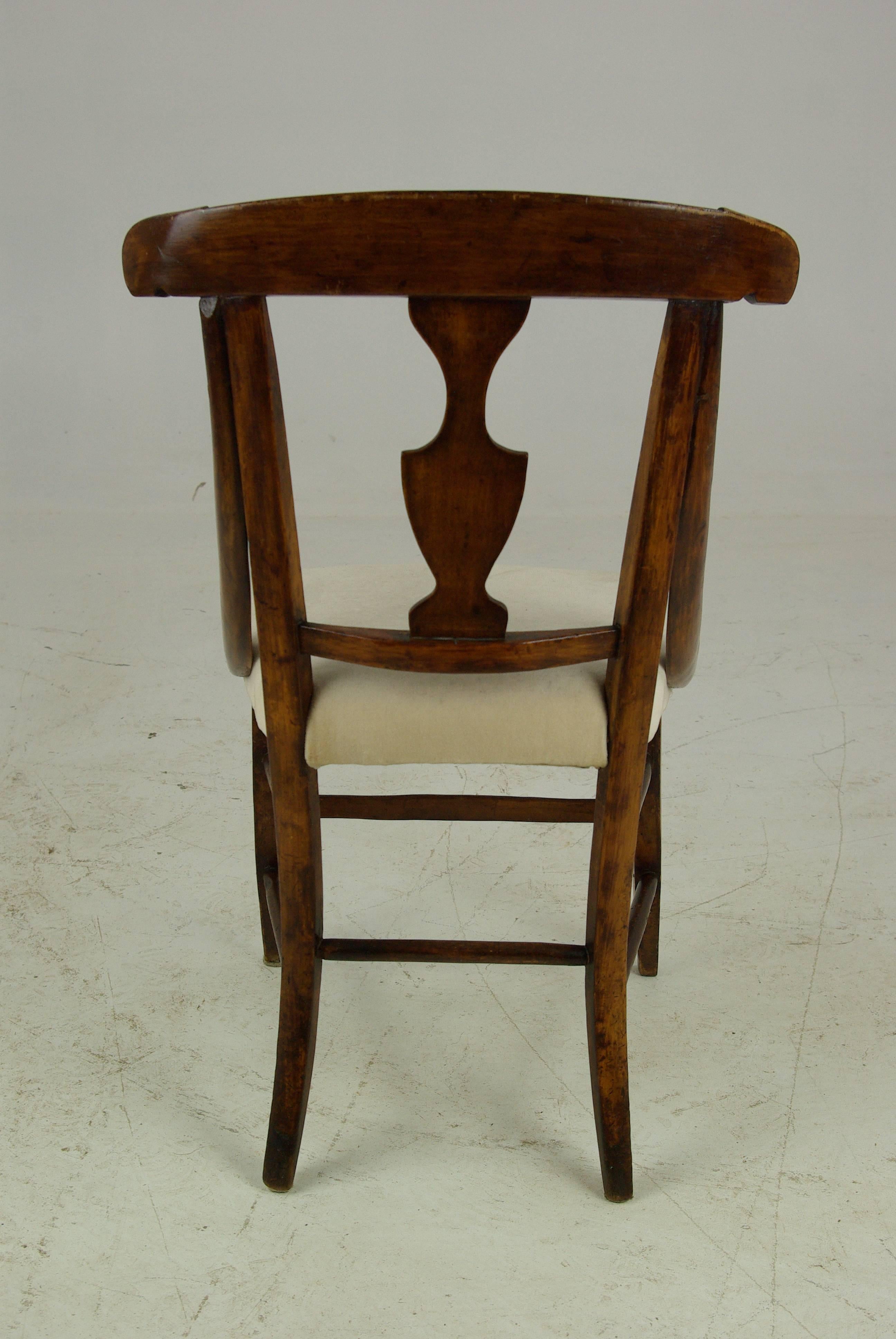 Antique dolls chair, childs chair, Victorian, Sycamore, Scotland 1880, B1140.

Scotland, 1880.
Solid sycamore wood
Curved top rail
Central shaped slat
Upholstered seat
Curved front and back legs
Untied by six stretchers for support
Nice