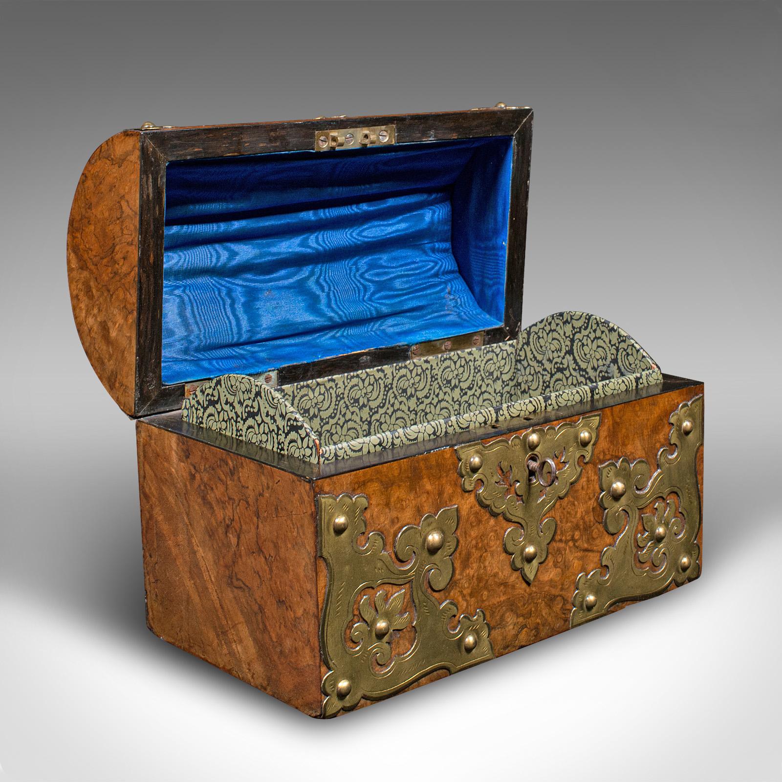 This is an antique domed top caddy. An English, burr walnut and brass keepsake box or dressing table case, dating to the Victorian period, circa 1870.

Of captivating form and superb decorative appeal
Displays a desirable aged patina and in good