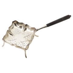 Antiguo colador de té con pie Dominick & Haff Silver de plata de ley