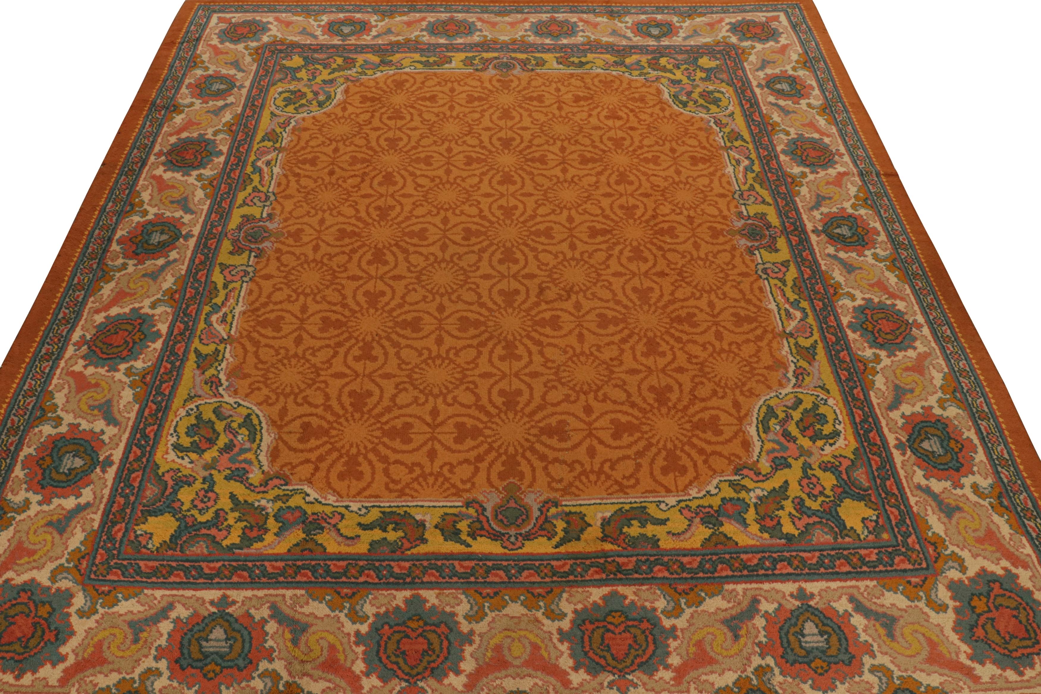 Arts and Crafts Antique Donegal Arts & Crafts Rug in Orange with Floral Pattern For Sale