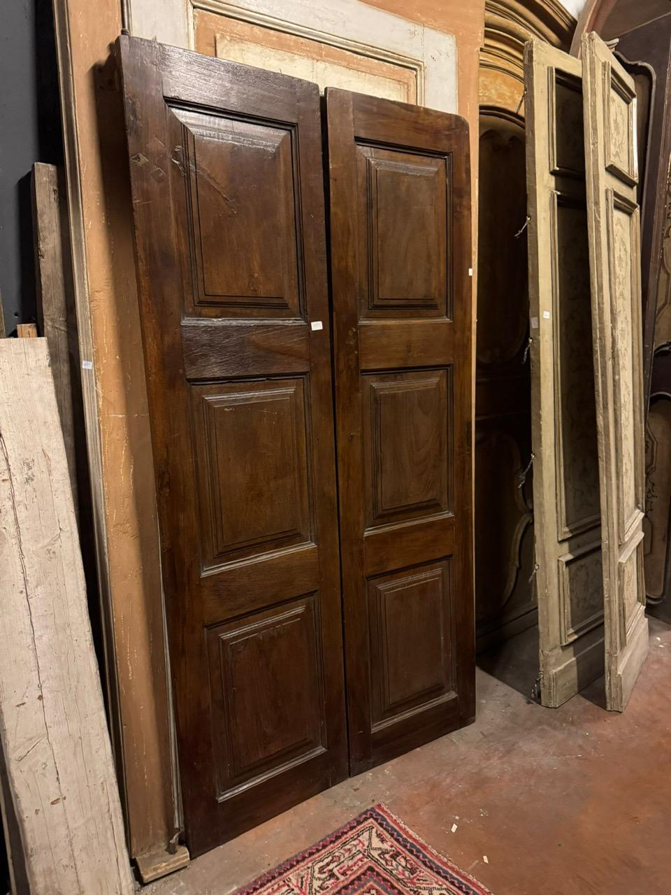 Antique door in walnut wood, two leaves with carved panels, Italy For Sale 1
