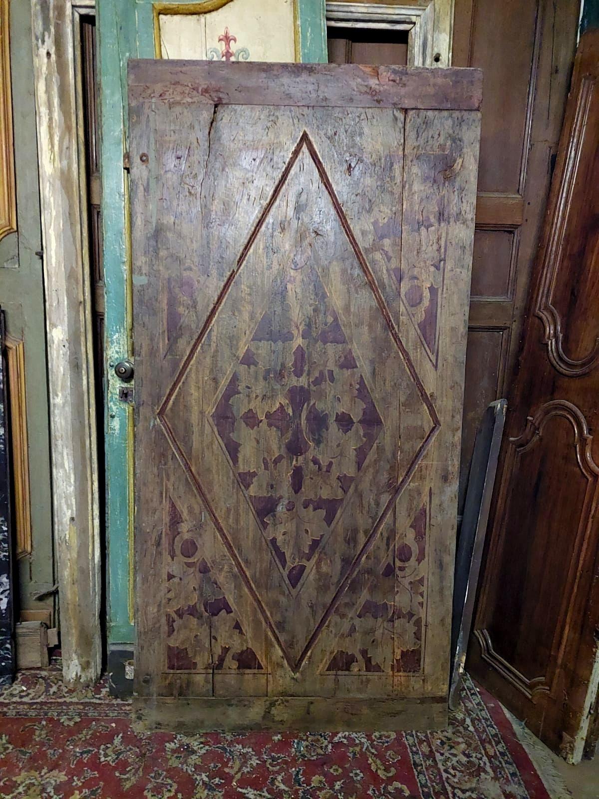 Ancient single interior door, hand-painted with a very swirling baroque motif and hand-sculpted with lozenge, smooth back as they embellished only a part of the house, built in the middle of the 19th century in Italy.
Ideal both as a normal door,