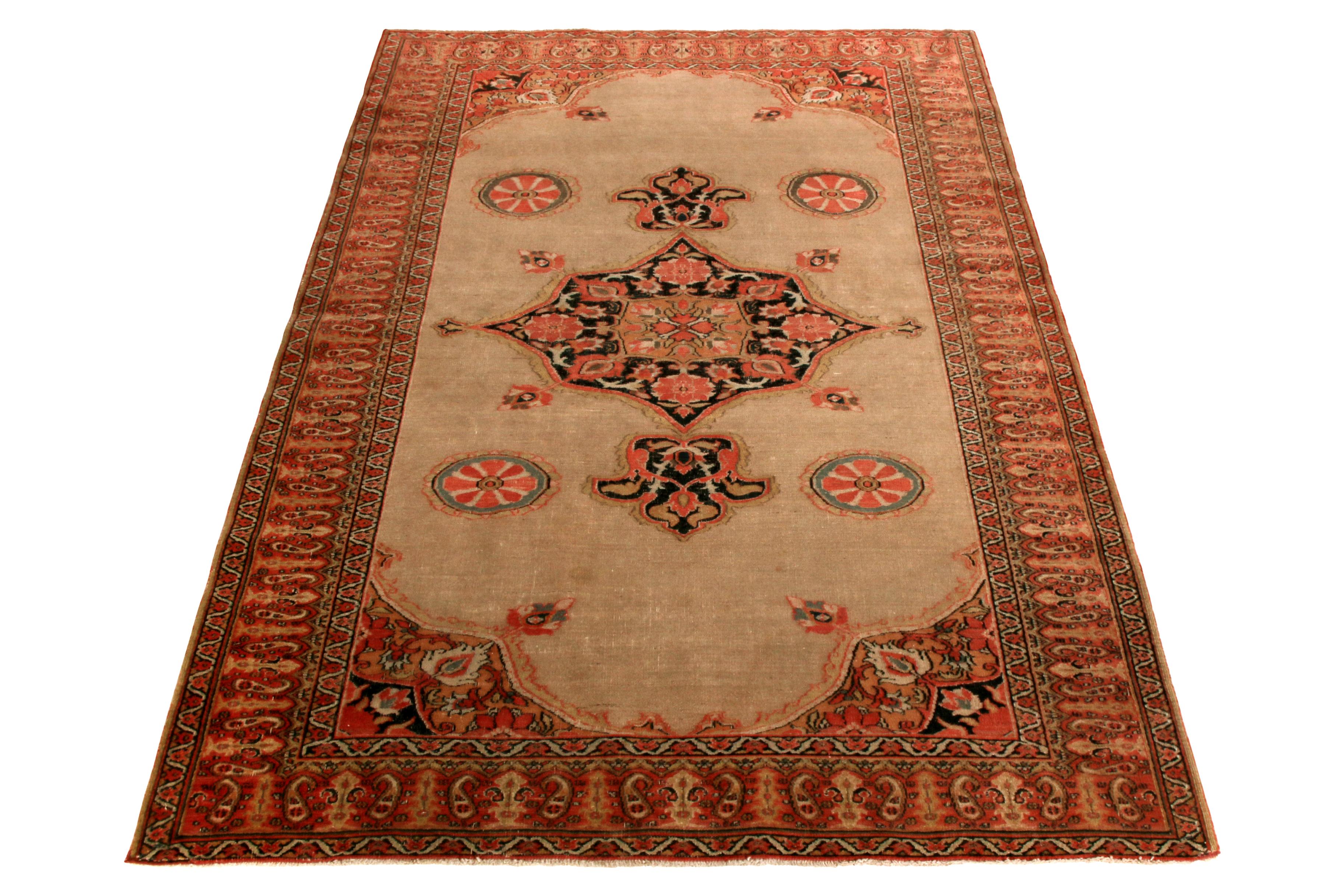Hand knotted in wool originating between 1890-1900, this antique Doroksh rug hails from the Doroksh province of Persia, acclaimed for the rarity and widely regarded decorative appeal of a Persian rug from this region. Enjoying a distinct black