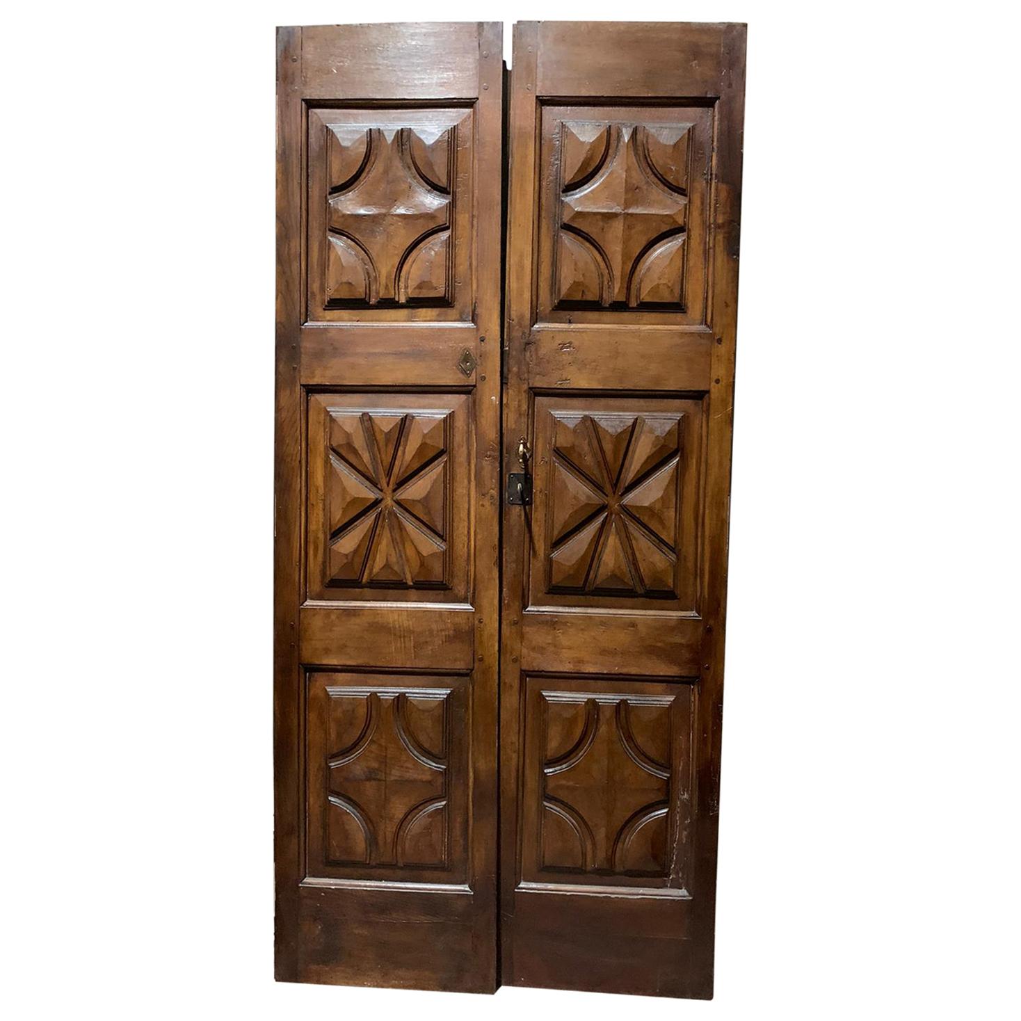Antique Double Door Carved in Brown Walnut, Diamonds and Stars, Italy '600 For Sale