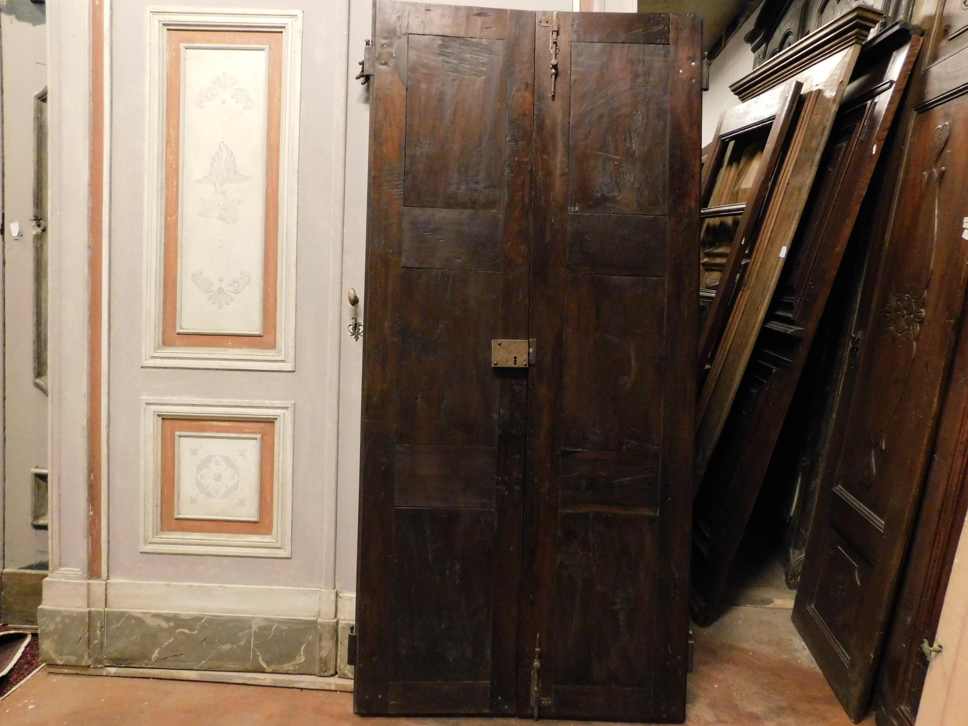 Italian Antique Double Door in Brown Walnut, Cross-Carved Panels, Original Iron, 1600 For Sale