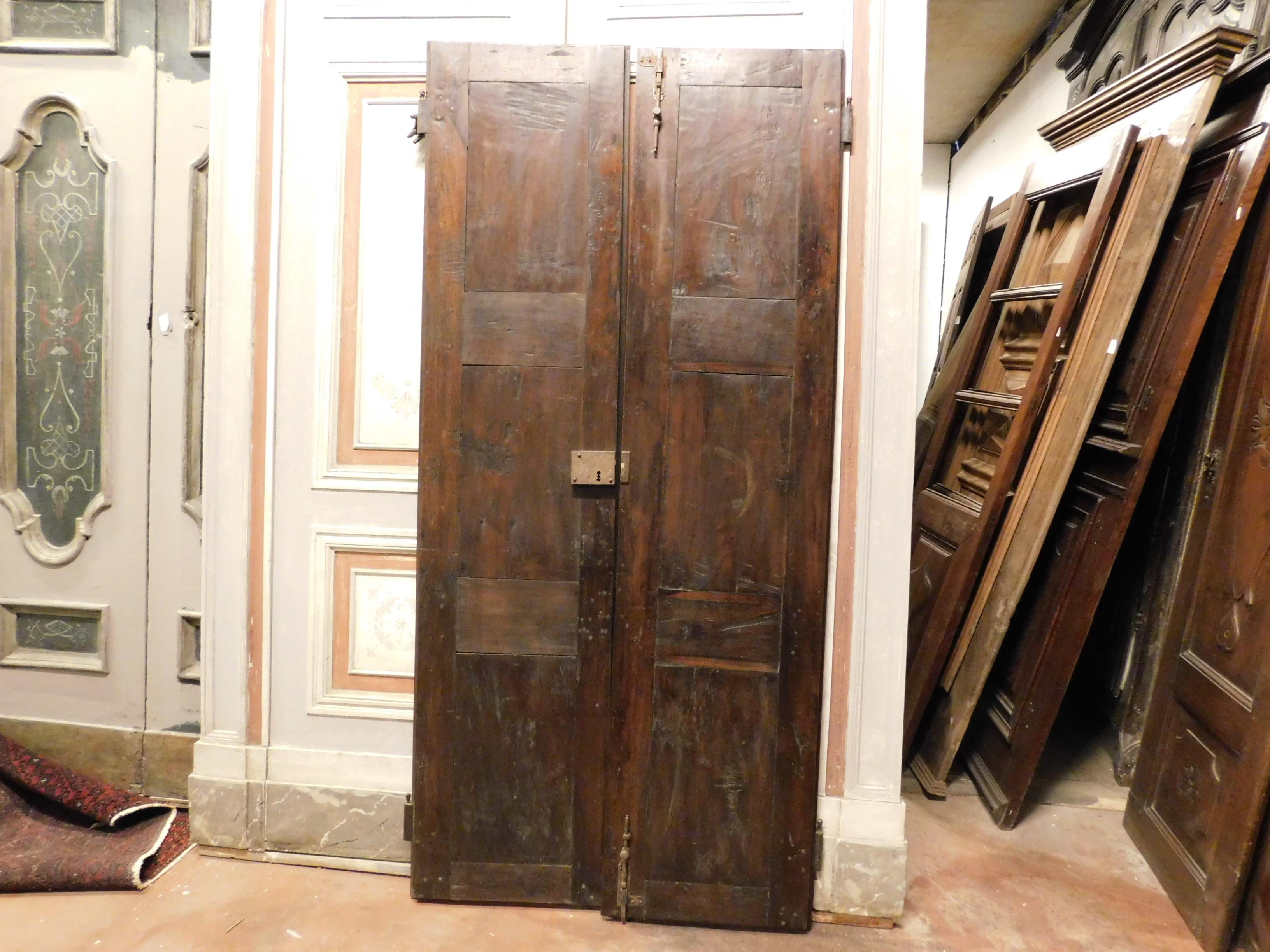 Hand-Carved Antique Double Door in Brown Walnut, Cross-Carved Panels, Original Iron, 1600 For Sale