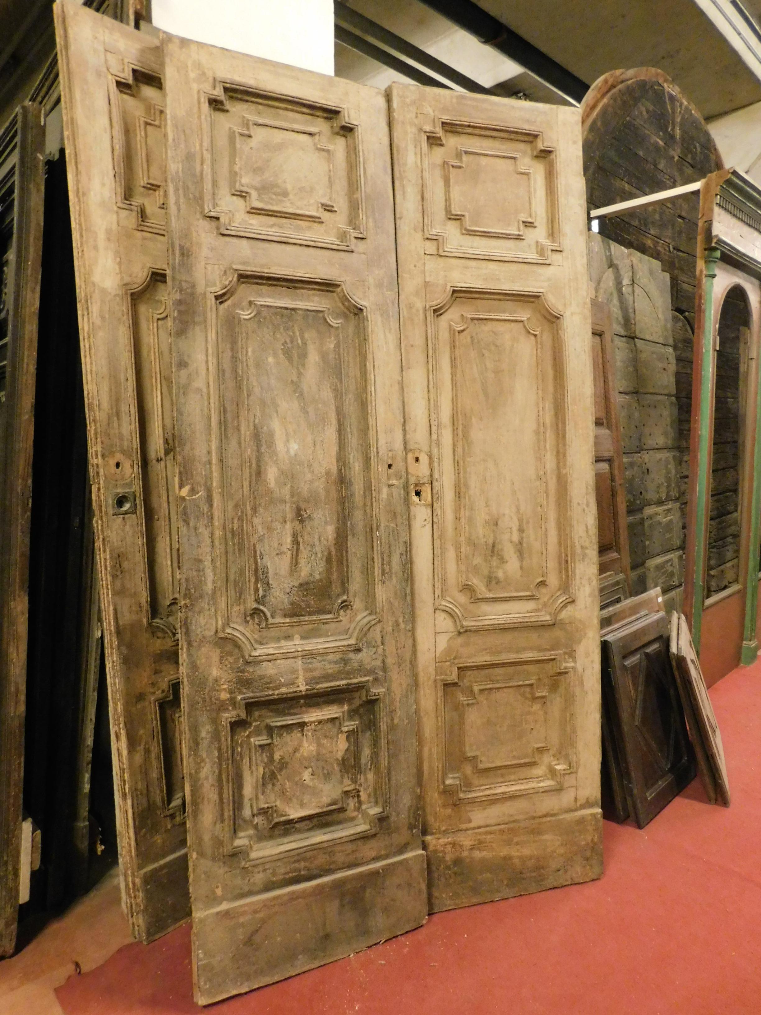 Antique double doors in light fir wood, light honey colored, can be lacquered as they have been stripped, hand carved in Louis XVI style, Italy, 1700.
Beautiful pair of double doors, suitable in a luxury or super modern living room with contrasting