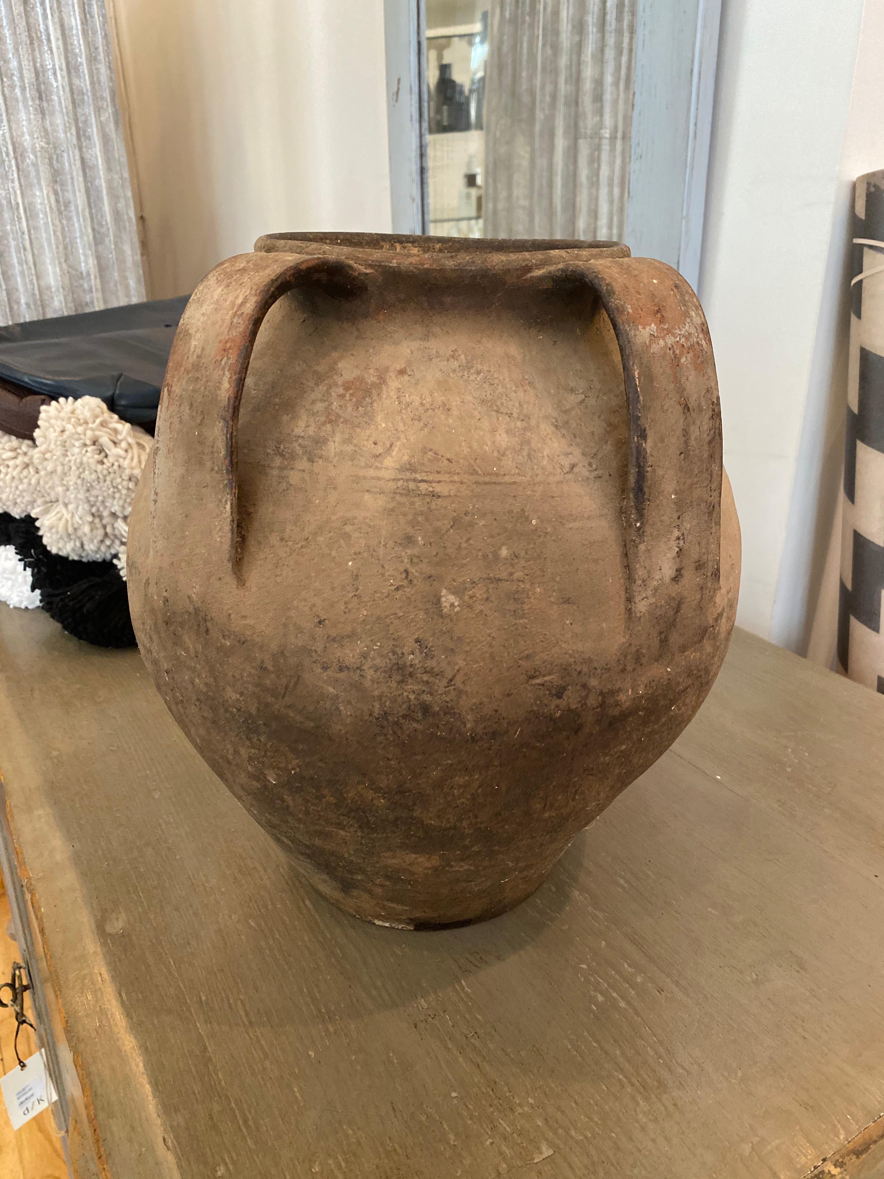 Vintage French handmade jug, in raw form (un-glazed). These jugs were primarily used in countryside. Beautiful color variation from the firing process and vintage residue from aging.