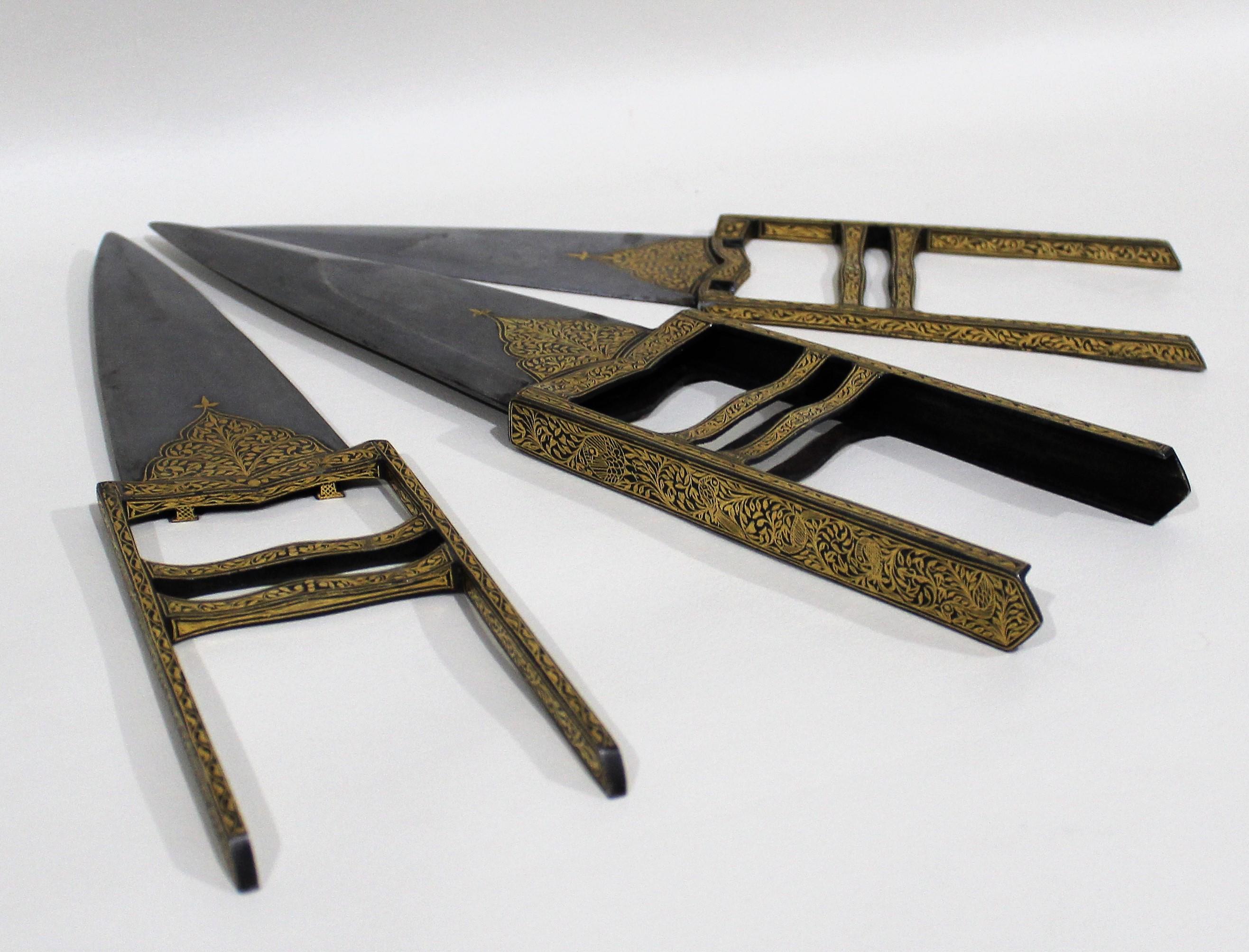 This Indian Katar “triplex” is made from Damascus steel and consists of two split halves, which are joined into one, and invested in the Qatari sheath. This Katar features gold damascene patterns that were done by a master craftsmen of the period.