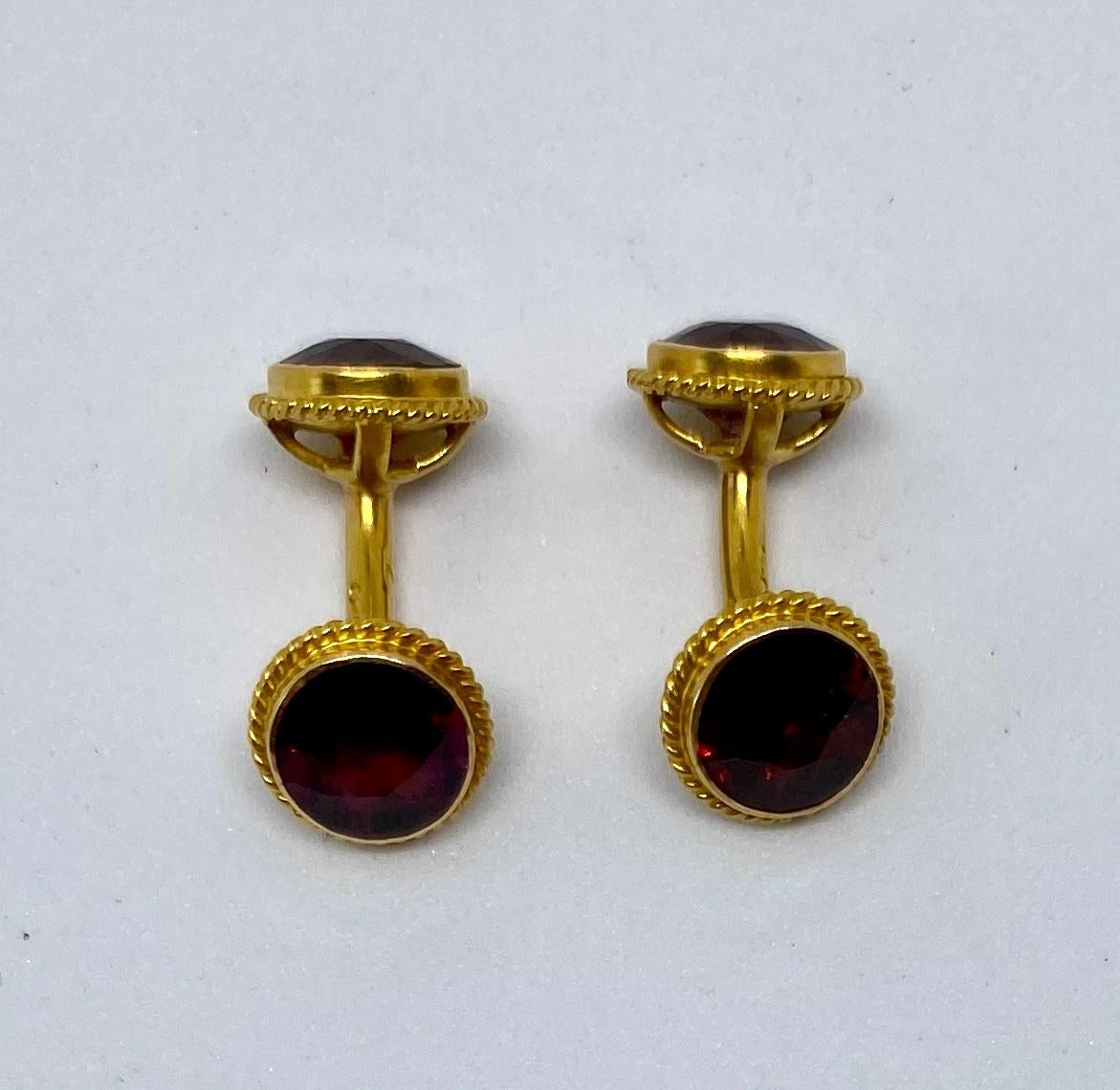 Toward the end of the 19th Century, two things happened in cufflink design: they became smaller, and they became more colorful. 

These beautiful and unusually well-preserved cufflinks are from that era. Made by Day, Clark & company of New York,