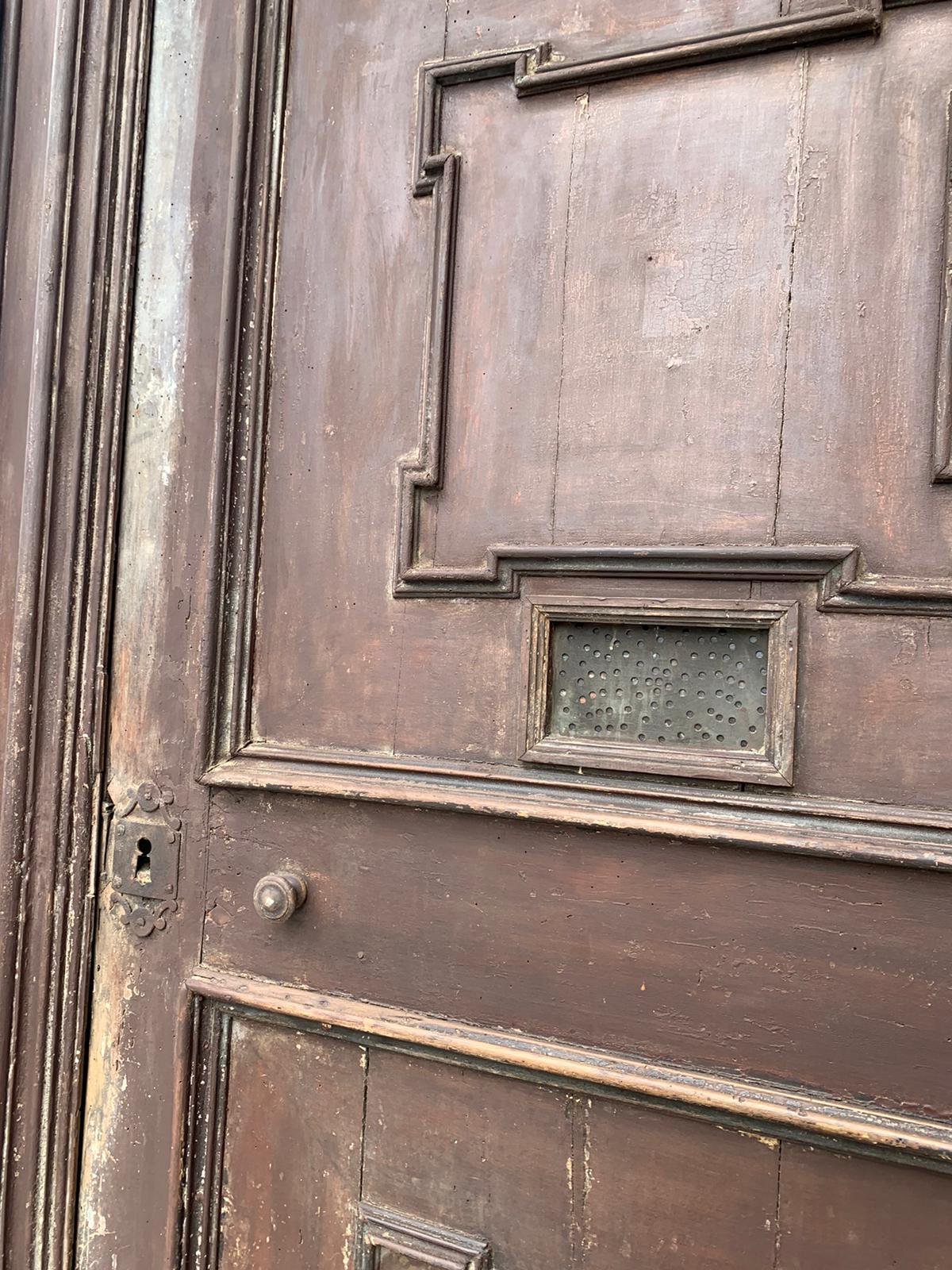 Hand-Carved Antique double-sided entrance door in carved walnut, 18th century Italy For Sale
