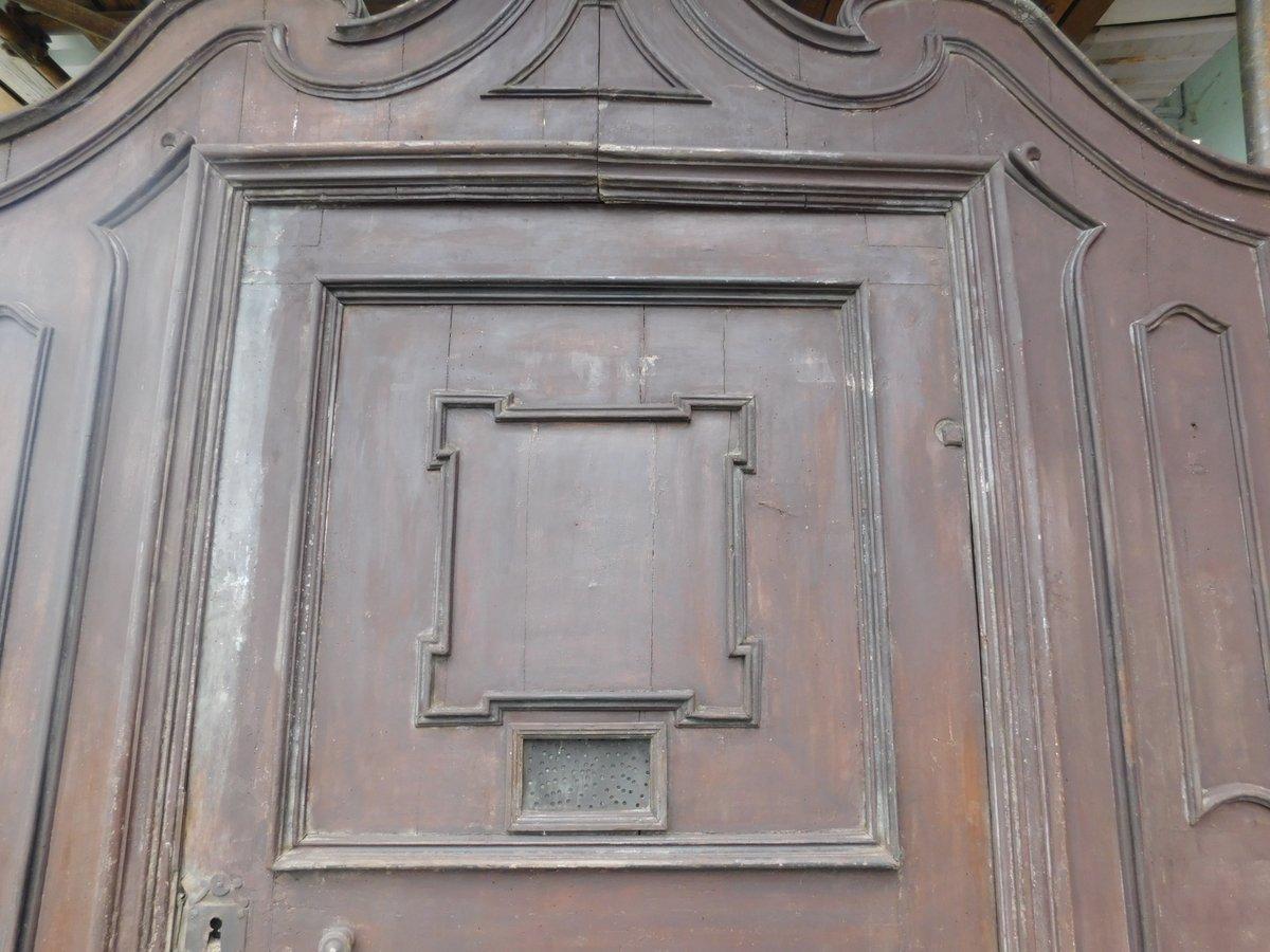 Hand-Carved Antique double-sided entrance door in carved walnut, 18th century Italy For Sale