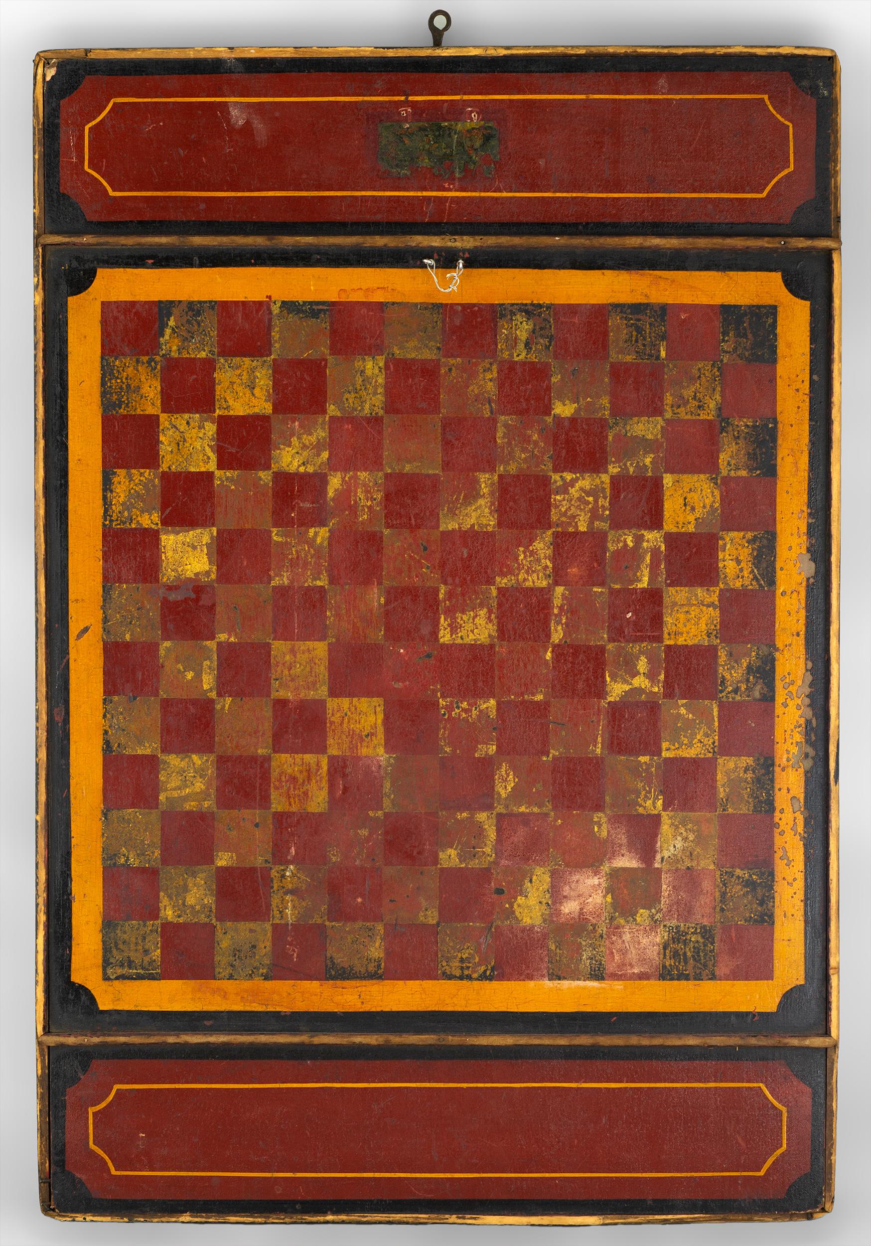 Polychrome double sided game board with
applied molding. The Parcheesi side is painted
with green, red, yellow, blue and purple with
leaf and floral decoration. The opposing side is
a checker board with a red and gold playing surface
American,