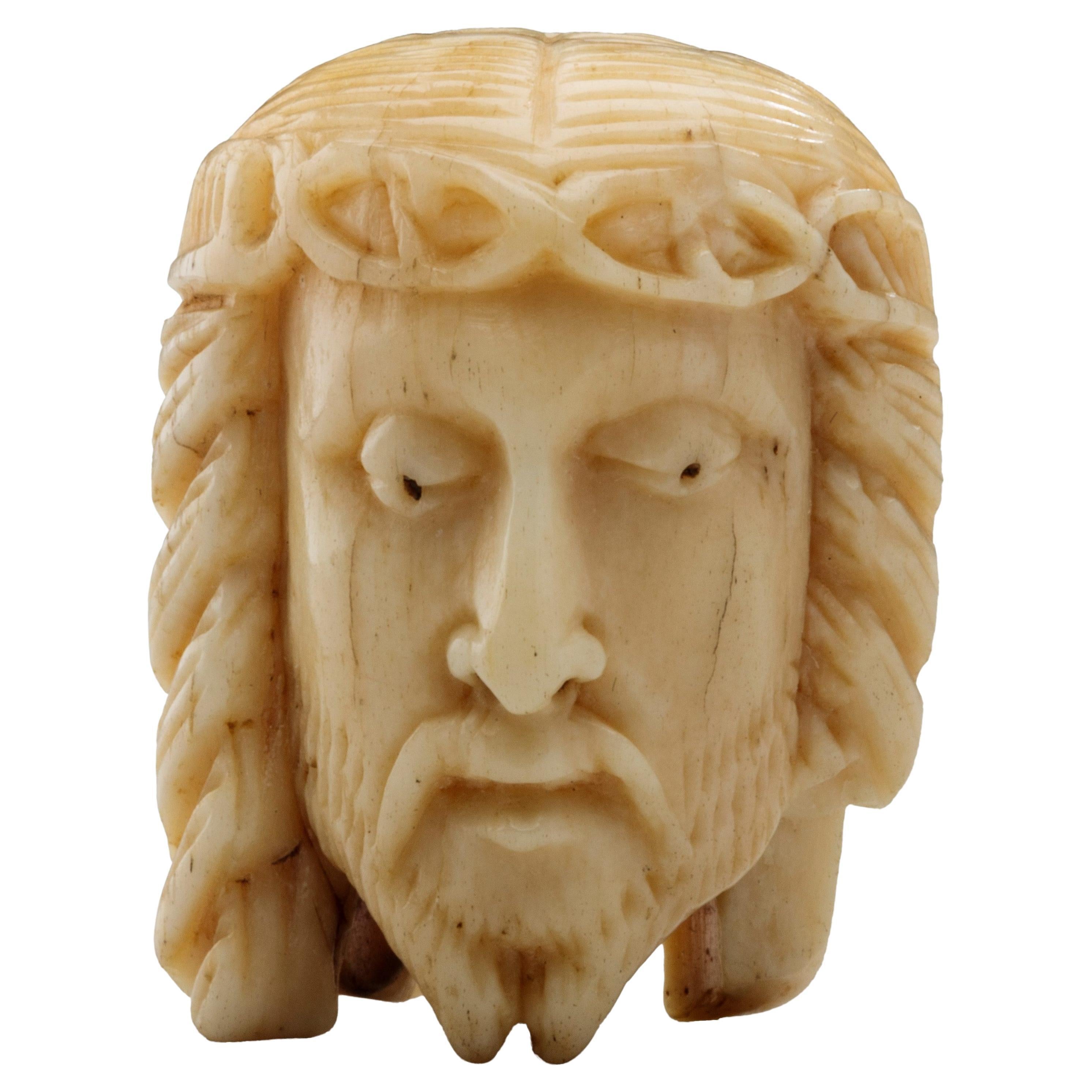 Antique Double Sided Rosary Bead with Head of Christ and Skull Carved in Bone For Sale