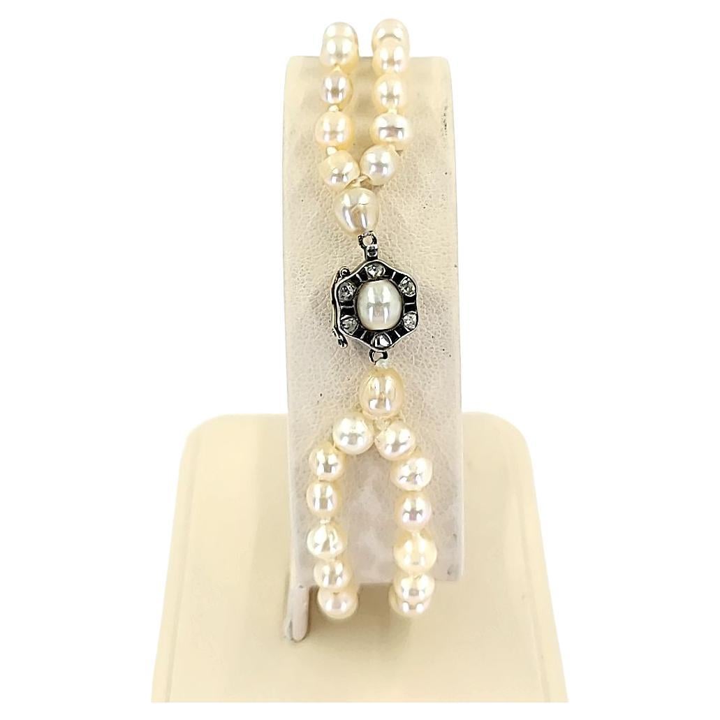 Bracelet ancien à double rang de perles naturelles en vente