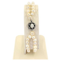 Bracelet ancien à double rang de perles naturelles