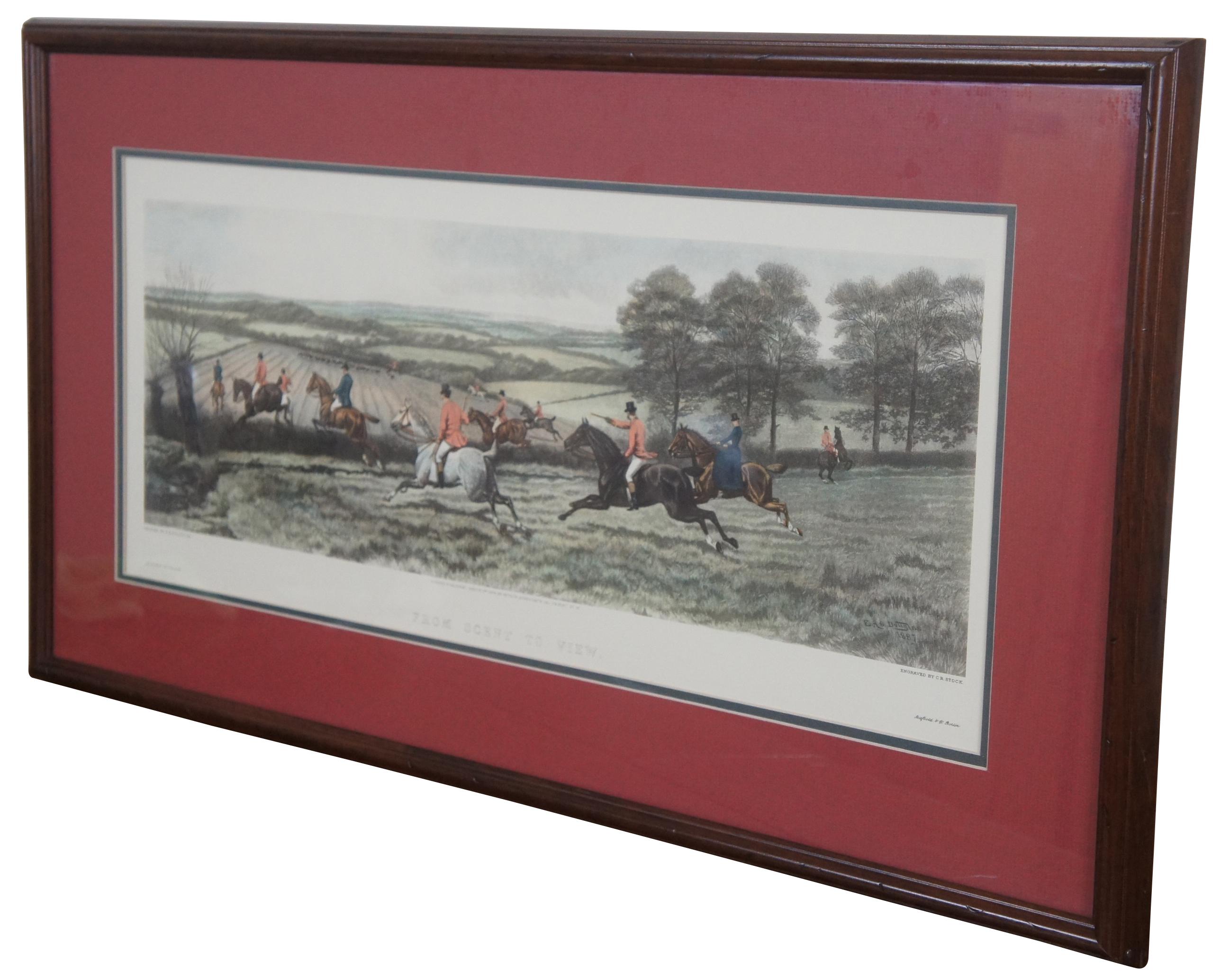 Antique colored lithograph print of an English equestrian and fox hunt scene featuring horses hounds galloping through the landscape of fields. Titled “From Scent to View,” from a painting by E.A.S. Douglas and engraved by C.R. Stock, London