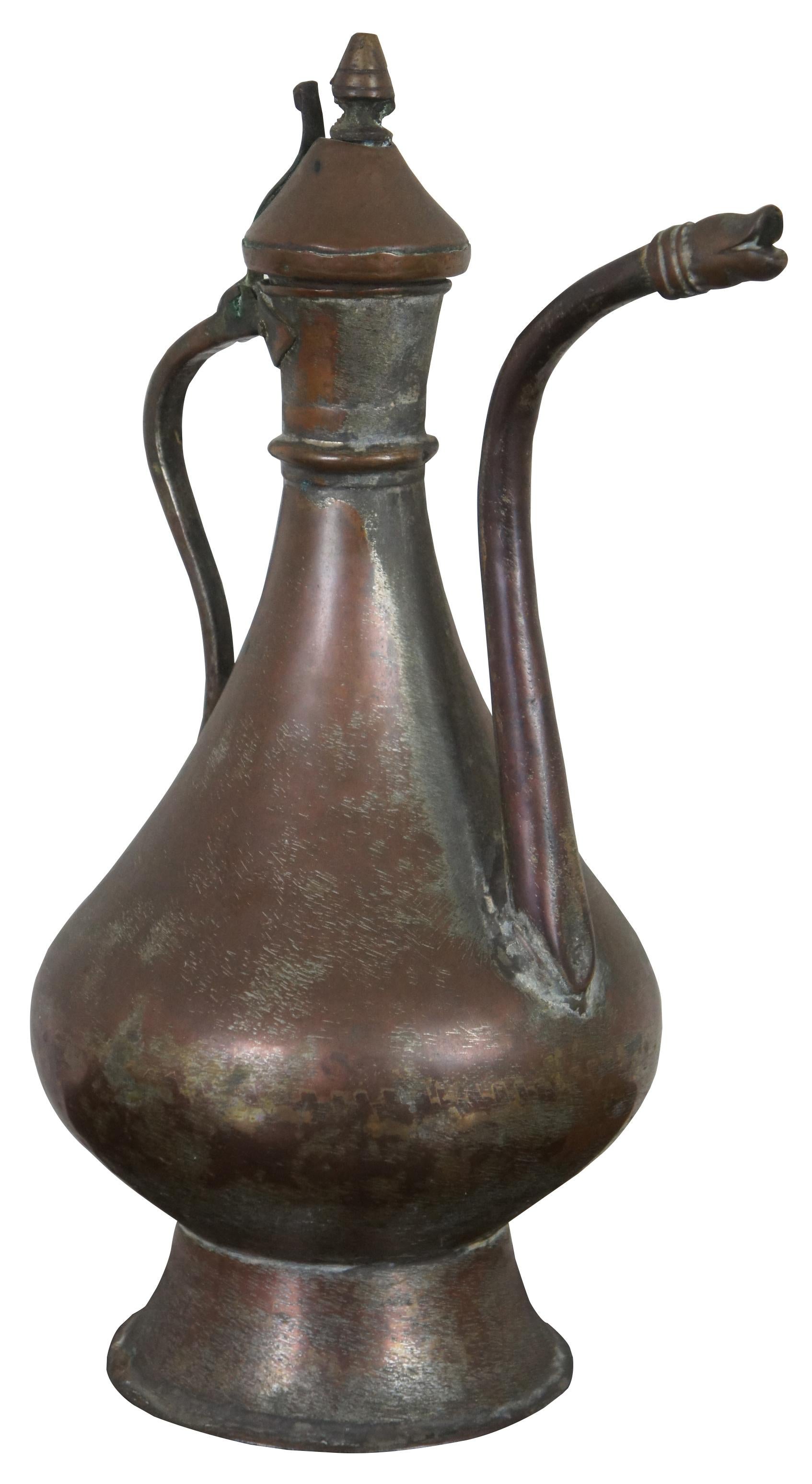 Antique dovetailed hammered copper pitcher / ewer / carafe with hinged lid and goose neck spout. Measures: 15