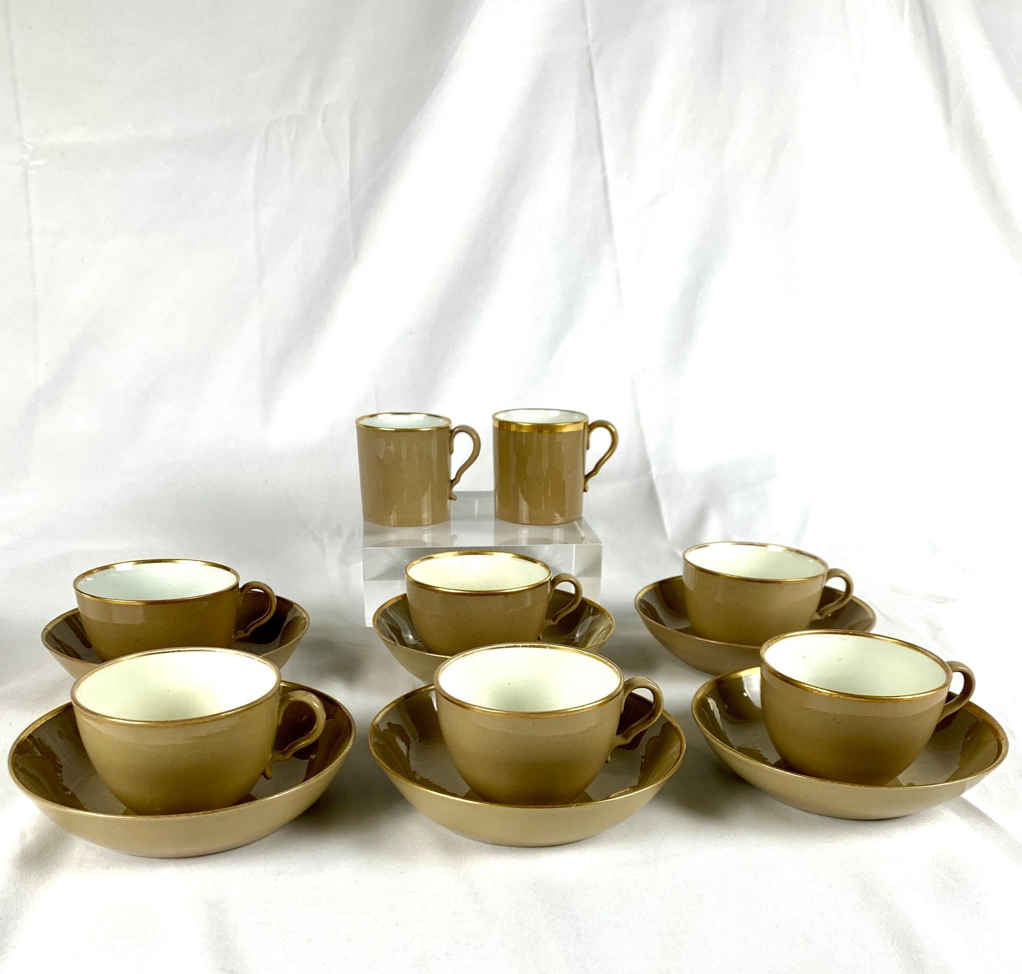 Made in England in the early 19th century, this set of drabware has six tea cups and saucers and a pair of coffee cans.
Unlike other colored earthenwares, which have a white body painted in various colors or tinted with colored glazes, drabware is