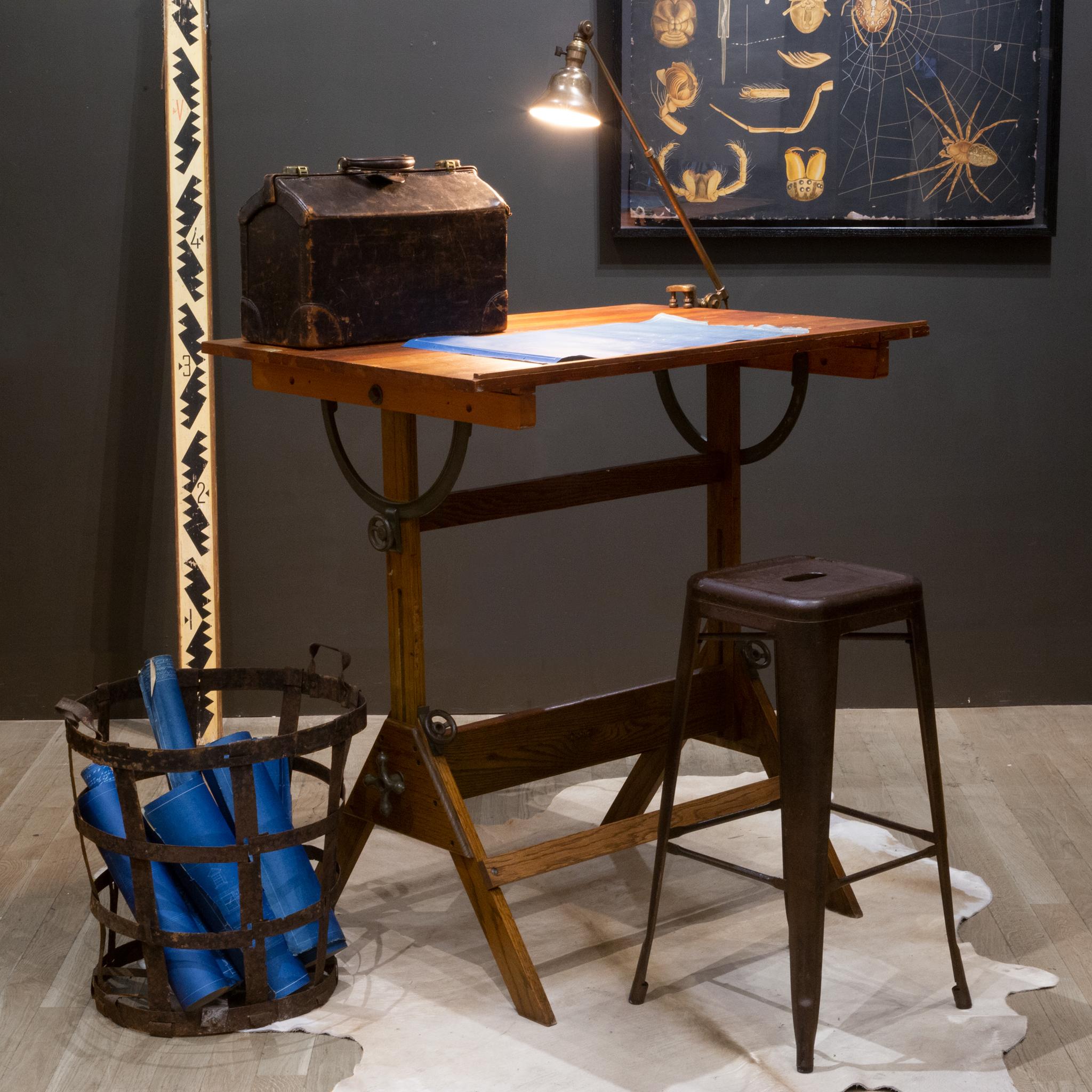 About

A fully adjustable industrial wooden drafting table with steel and cast iron knobs and brackets. The table can be used as a tall dining table, desk or drafting table. The top swivels at any angle and from either side. The whole table can be