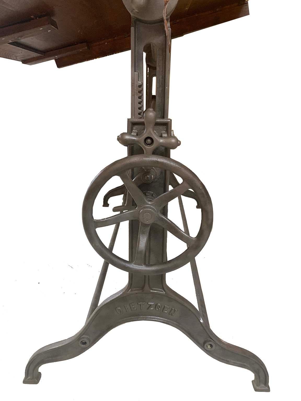 Dietzgen drafting table, makes a great stand up desk. Solid iron and maple wood. constructed solid and clean look. Cogs nicked on gear so adjustable up and down is a bit hard.