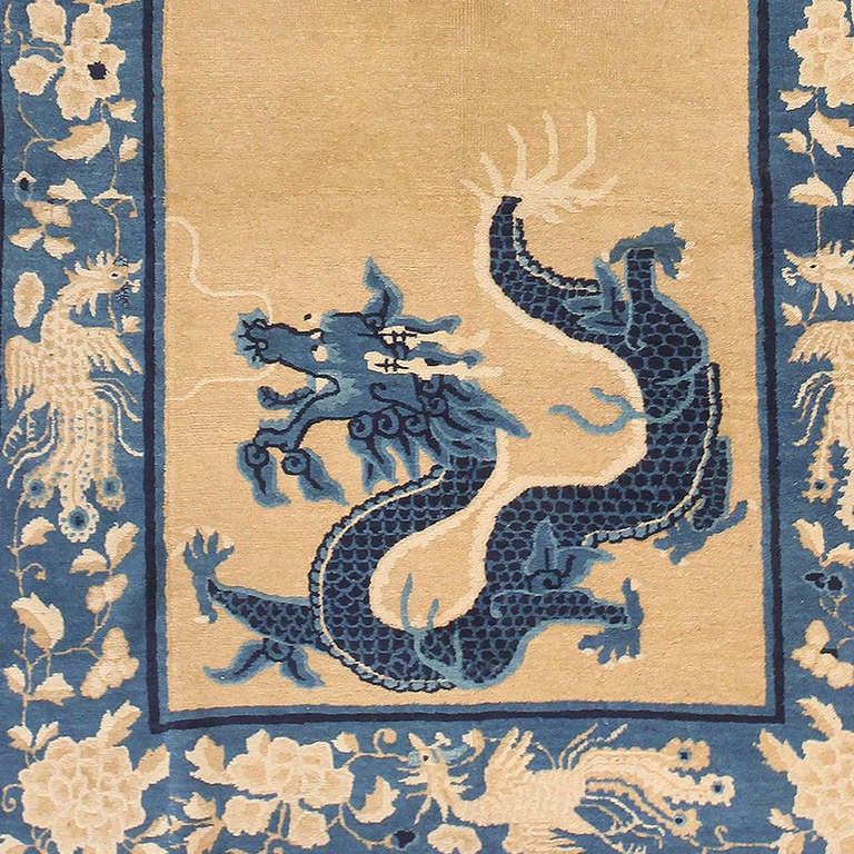 Antique Chinese rug, Origin: China, circa early 20th century. Size: 4 ft x 10 ft (1.22 m x 3.05 m)

Ideal for broad corridors and narrow spaces, this antique Chinese dragon carpet has an impressive visage that exudes power and elegance. In a