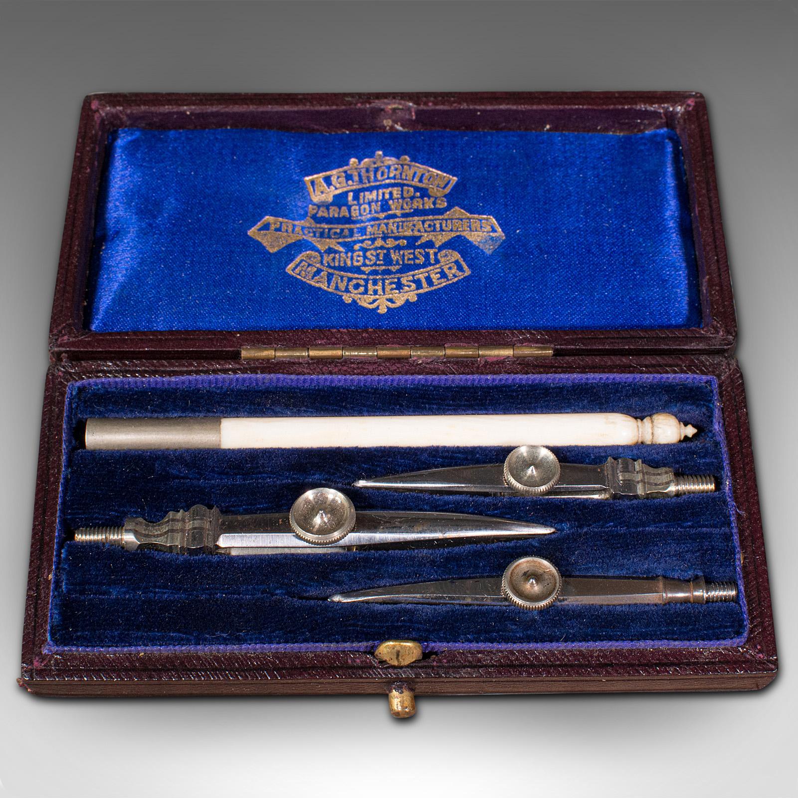 This is an antique draughtsman's pocket ruling pen set. An English, silver nickel architect's instrument case by A.G. Thornton of Manchester, dating to the early 20th century, circa 1920.

Appealingly portable ruling pen set
Displaying a