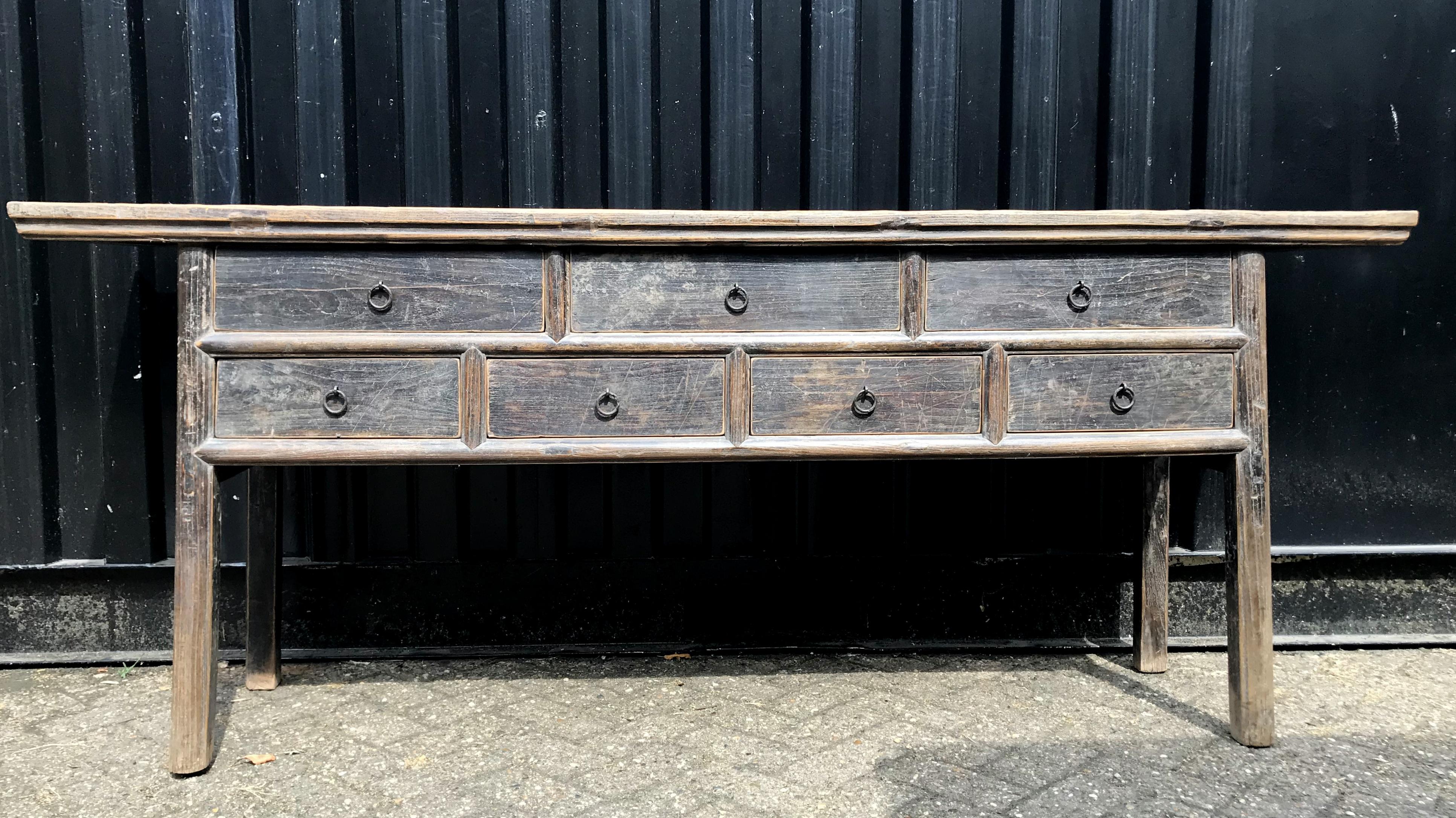 Antique drawer sideboard with dark patina. The sideboard has been completely restored.