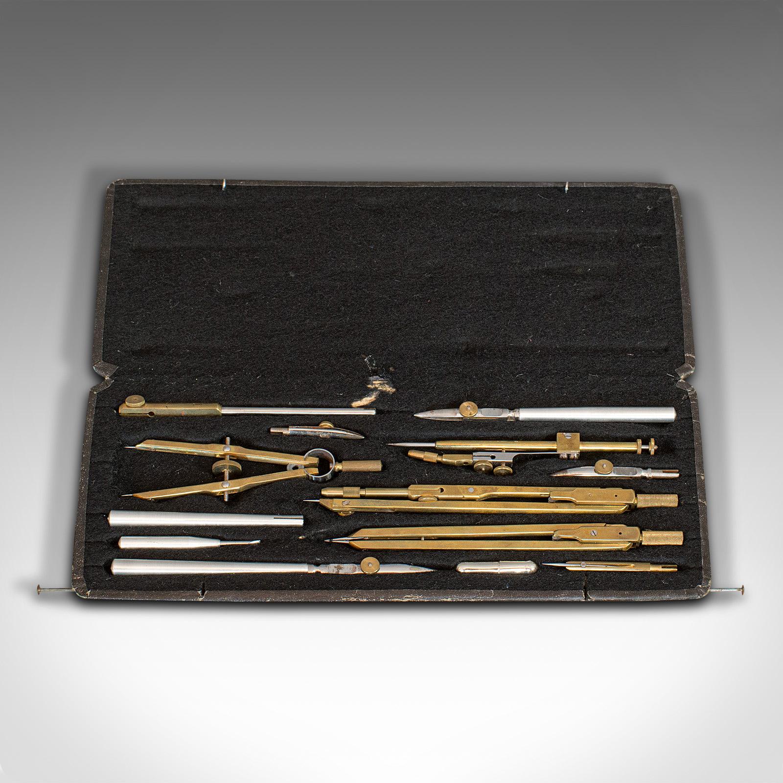 This is an antique drawing instrument set. A German, brass cartographer's or architect's technical drawing set, by Richter, dating to the Edwardian period, circa 1910.

Nicely presented set of instruments
Displays a desirable aged patina
Brass
