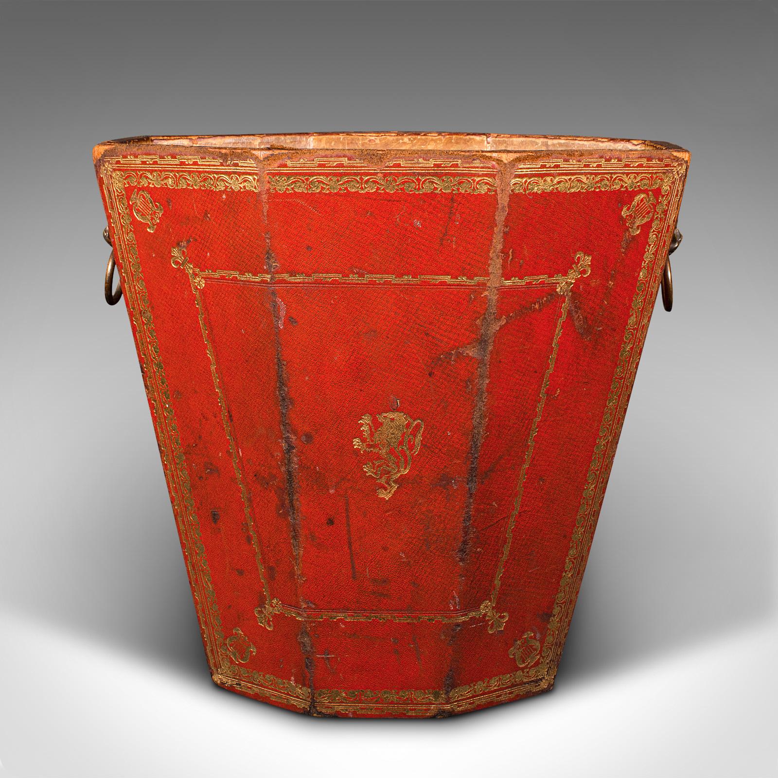 This is an antique drawing room paper bin. An English, aged leather and brass office basket, dating to the Georgian period, circa 1800.

Beautifully aged bin, with great colour and charming detail
Displays a desirable, well aged patina commensurate