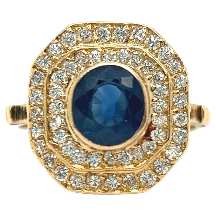 Antique Dreicer 
Co. Sapphire Diamond 18 Karat Yellow Gold Halo Ring