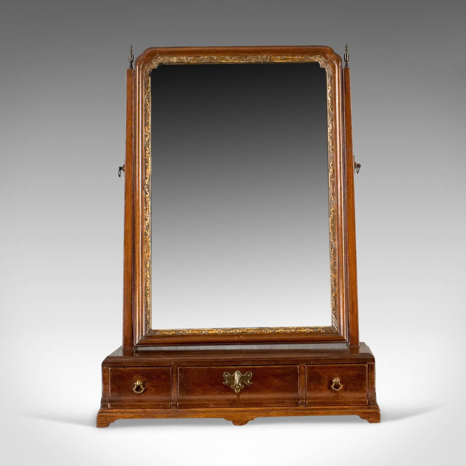 This is an antique dressing table mirror, an English, Georgian, mahogany, toilet or vanity mirror dating to circa 1800.

A delightful dressing table vanity mirror
The mahogany frame displaying good colour throughout
The original mirror plate in