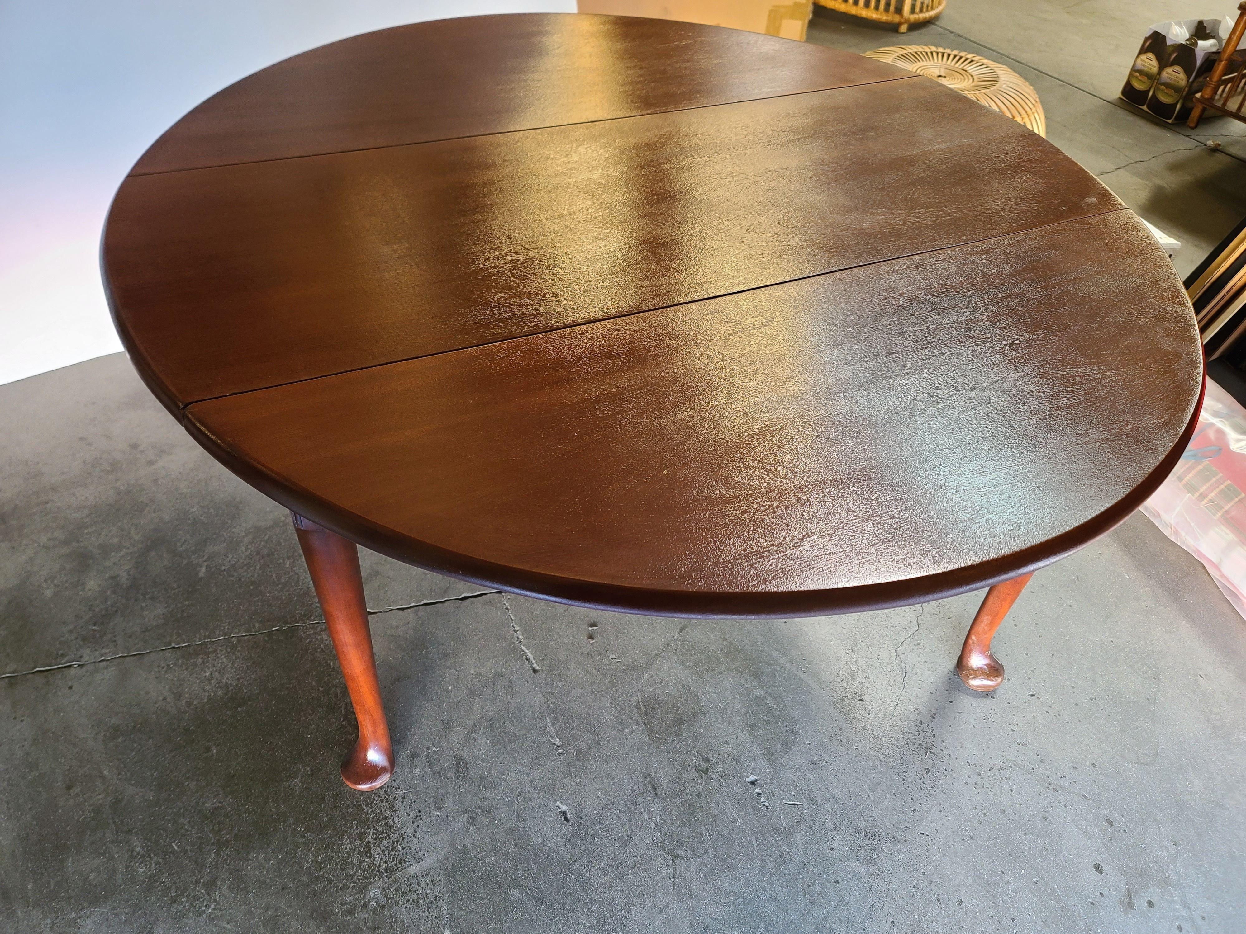 Large Mahogany drop leaf table 1940s great for a small useable dining space.