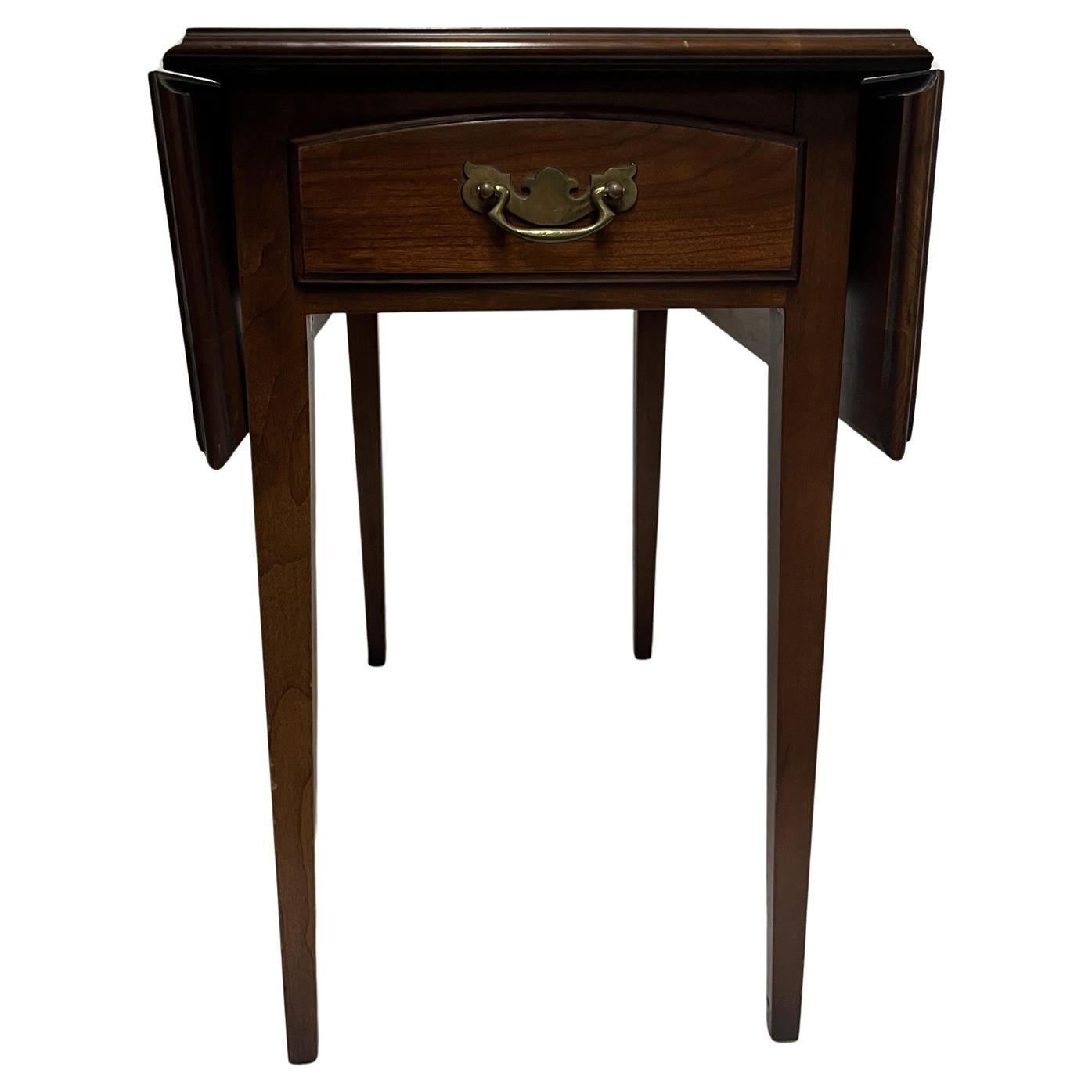 Vintage drop leaf table with single drawer
When the sides are closed the width is 13.5