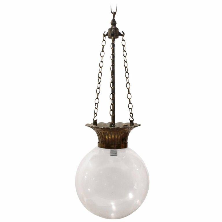 Antique Drugstore Glass and Bronze Show Globe Chandelier In Good Condition For Sale In Chicago, IL