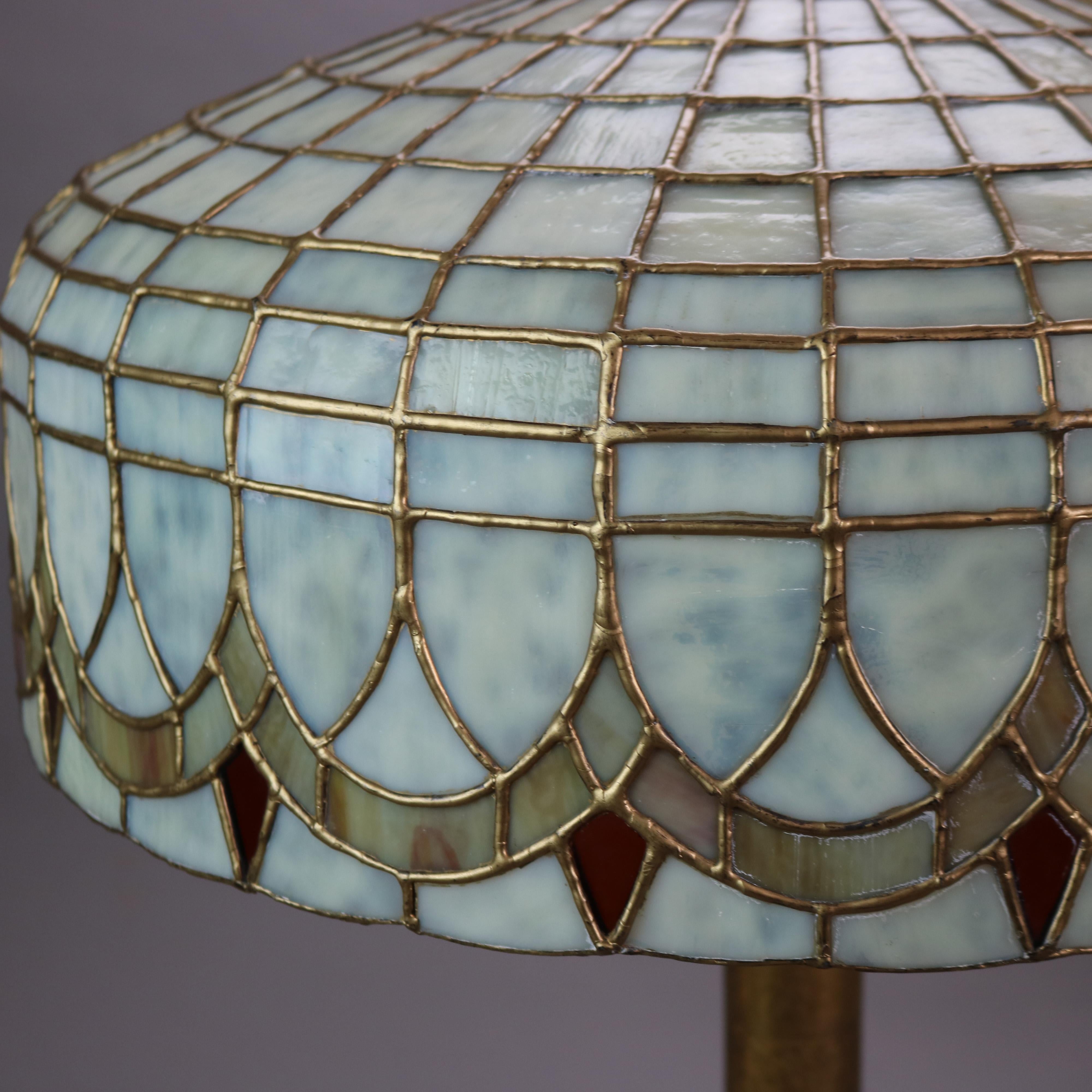 Antique Duffner & Kimberly Bronze, Stained & Dichroic Leaded Glass Table Lamp with Stylized Floral Elements, C1920

Measures - 27 7/8
