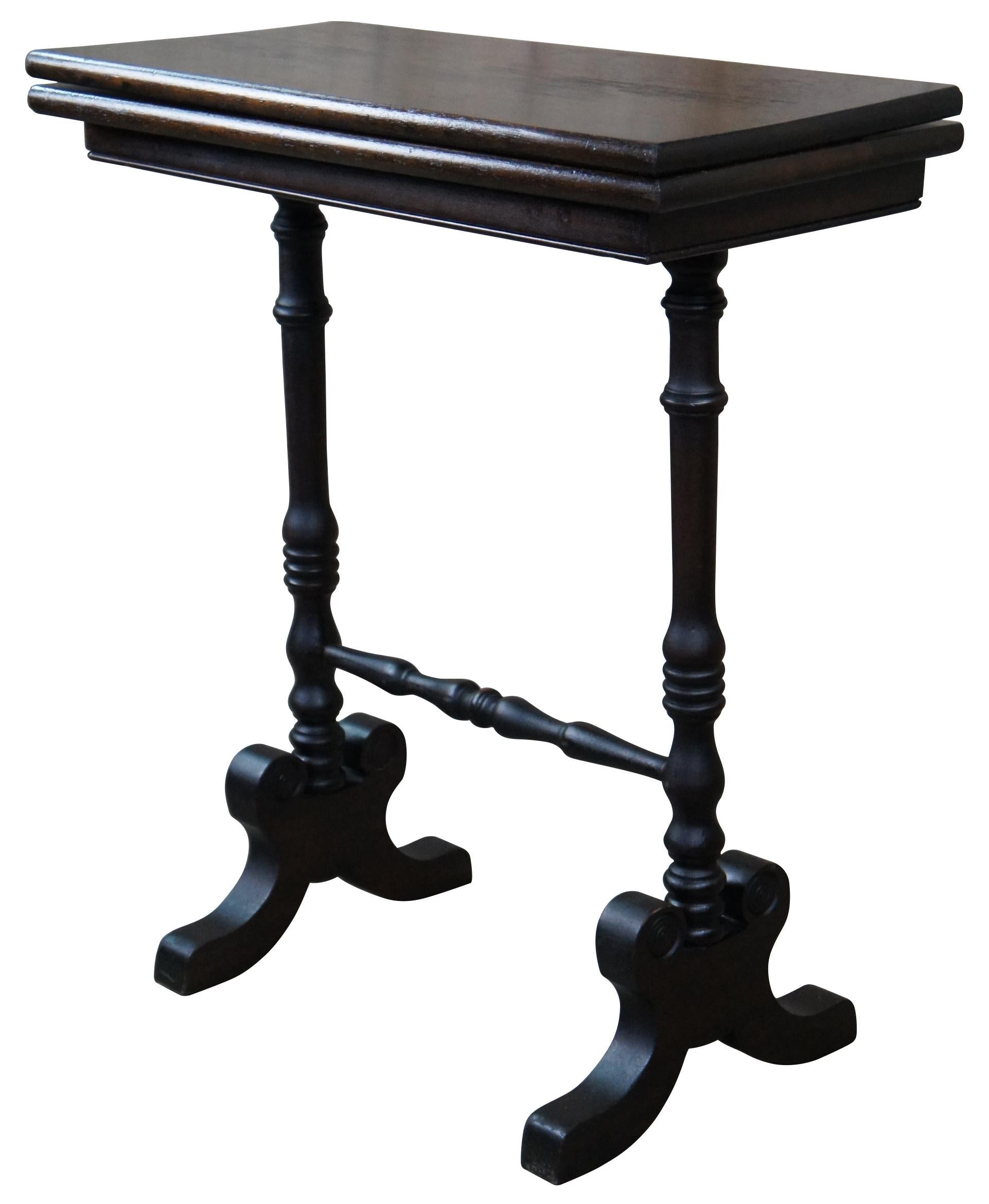 Duncan Phyfe inspired petite flip top game table. Made from walnut with a trestle base.

Measures: Opens to 24