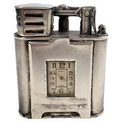 Dunhill, montre de sport ou briquet de poche antique à bras pivotant en argent sterling