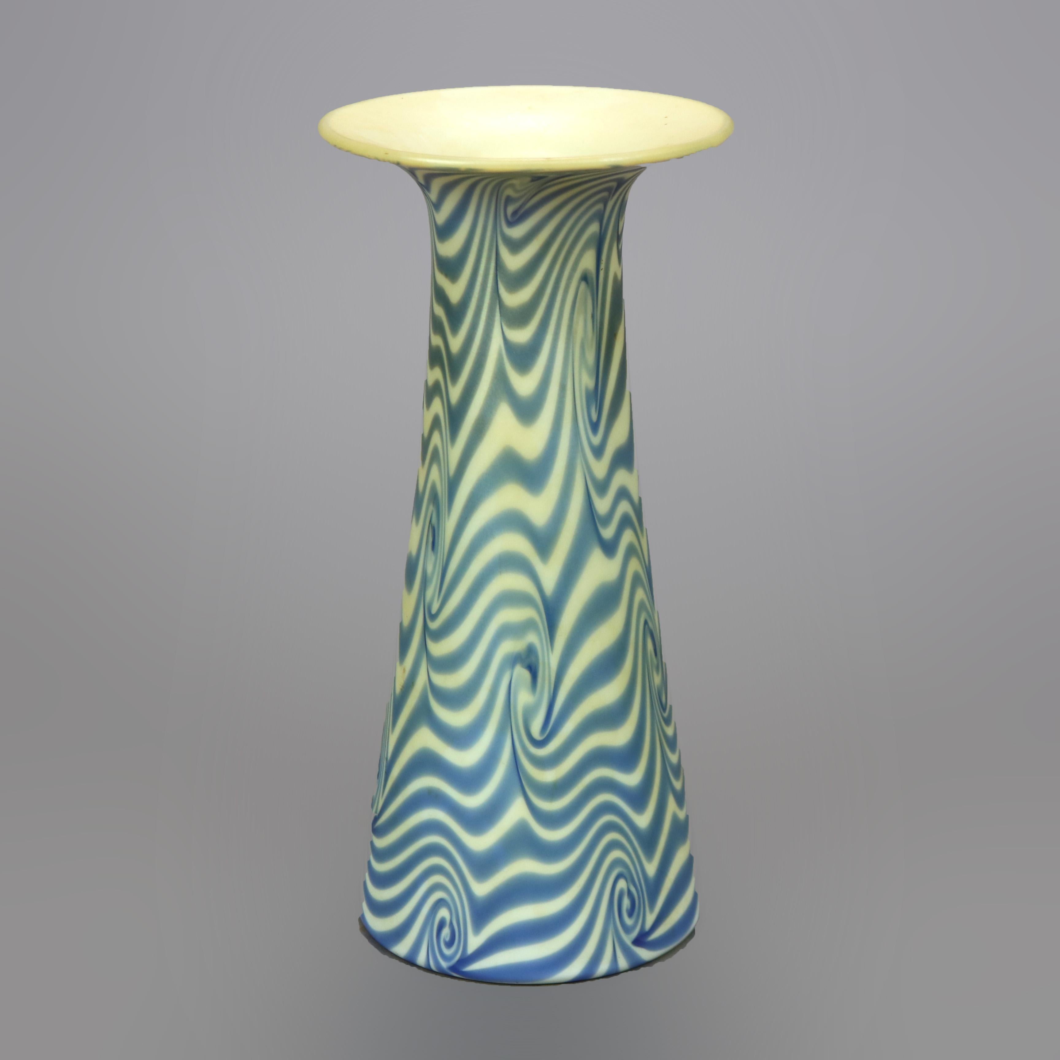An antique King Tut art glass vase by Durand offers flared form, artist signed as photographed, c1930

Measures- 7.25''H X 3.5''W X 3.5''D.