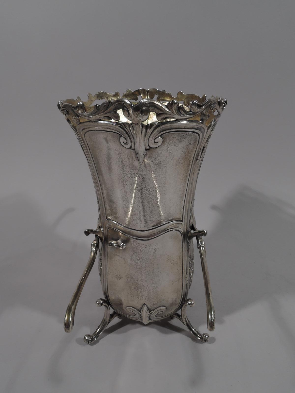 Rococo Revival sterling silver sedan chair vase. Made by Durgin (part of Gorham) in Providence in 1931. Deep and ovalish with applied open scrolled rim. Chased flowers and oval rondels inset with heads of olden-days belles in scrolled frames with