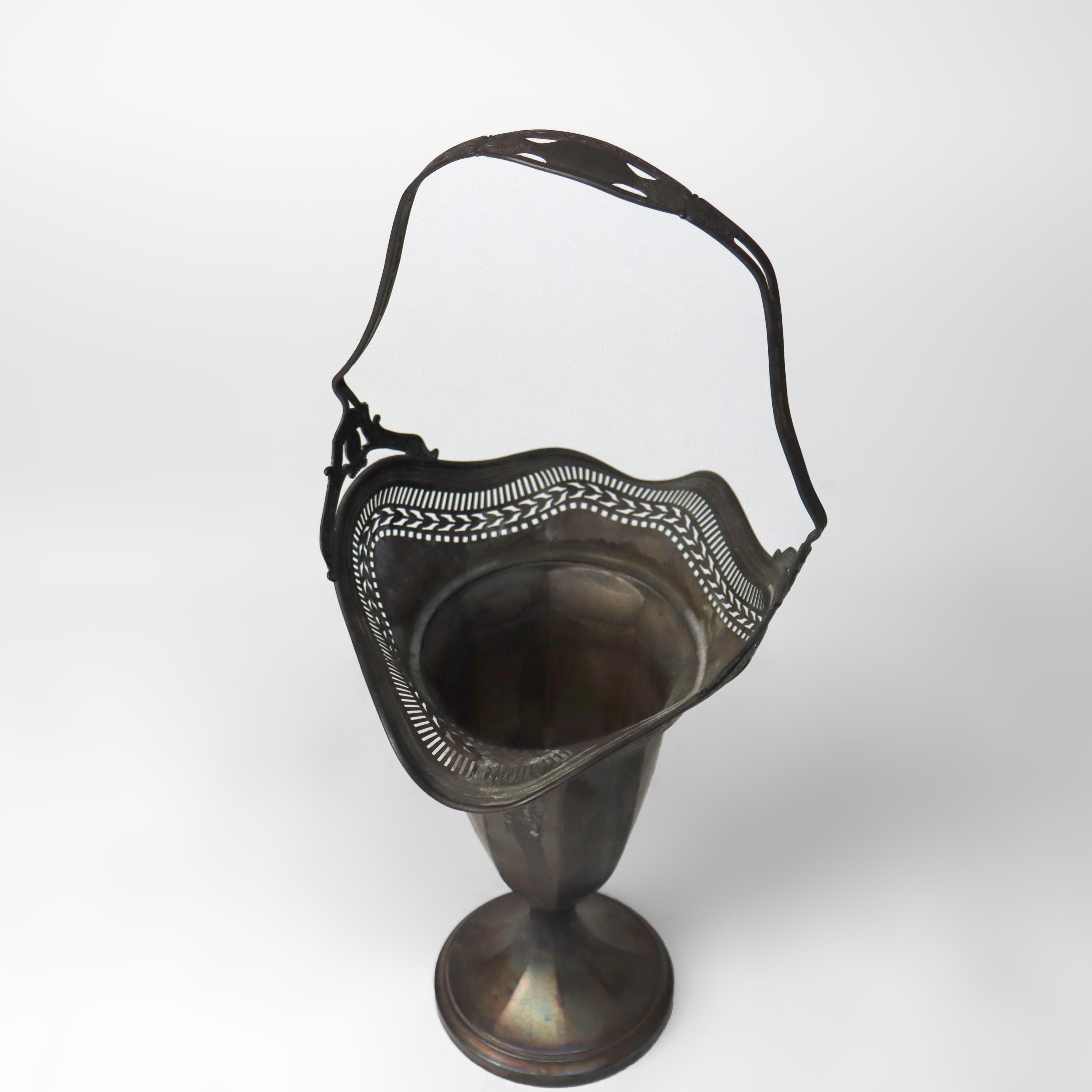 Antique Durgin Sterling Silver Reticulated Weighted Flower Basket Signed C1920.     
Dimensions - 19,5 