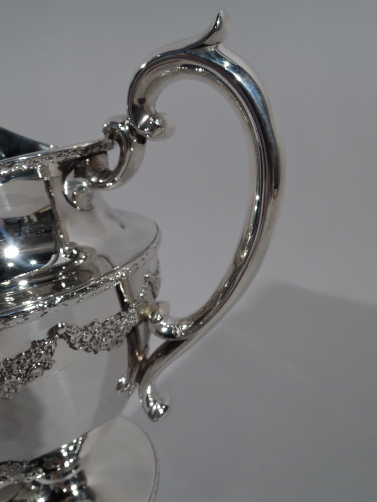 sterling silver water pitcher value