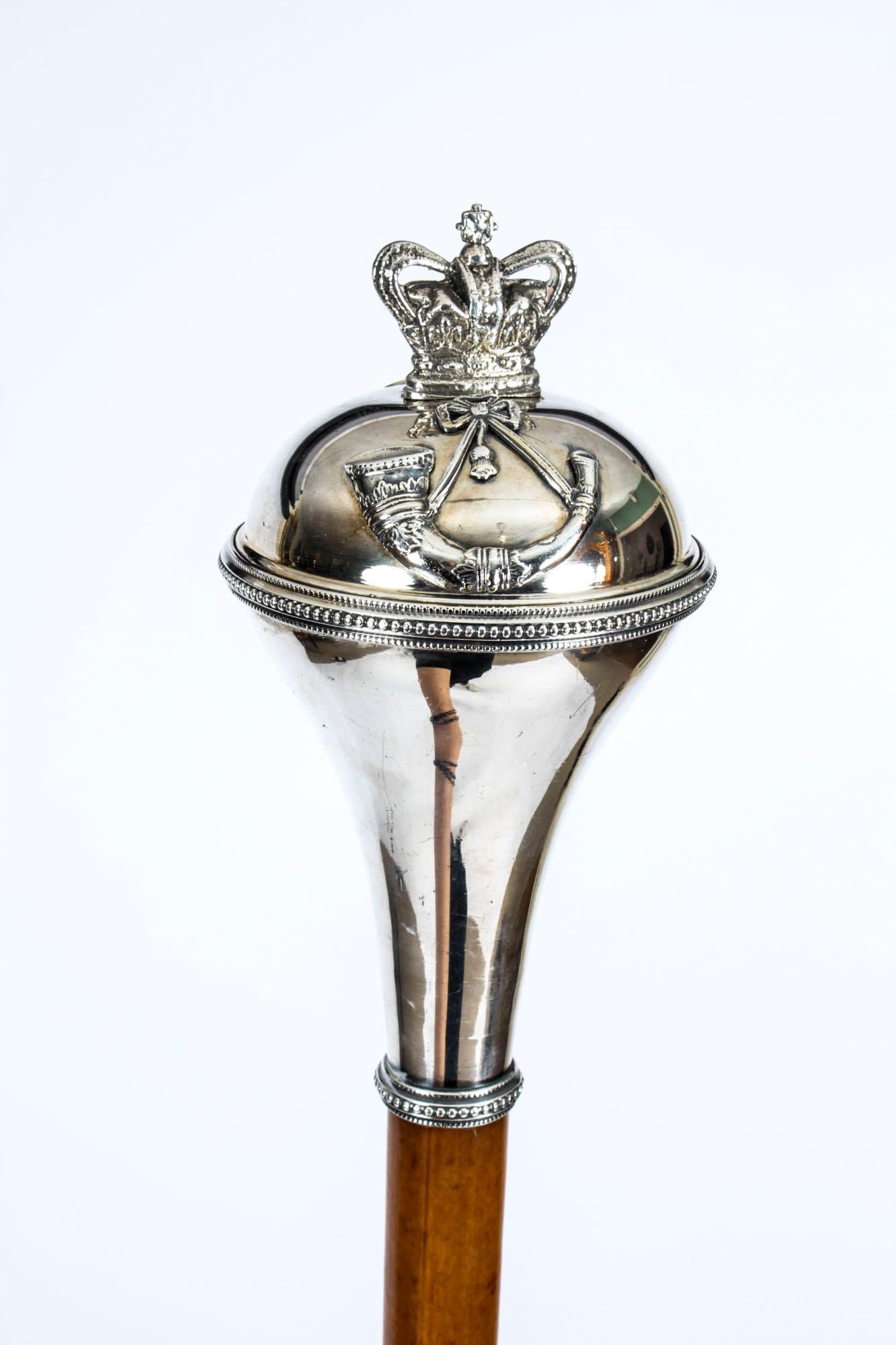 This is a superb Victorian rare silver-plated Malacca Drum Majors Pattern Band Mace, circa 1880 in date.

The mace features large ball top incorporating the pre 1902 crown, bugle horn and number '68', indicating the 1st Battalion, The Durham Light
