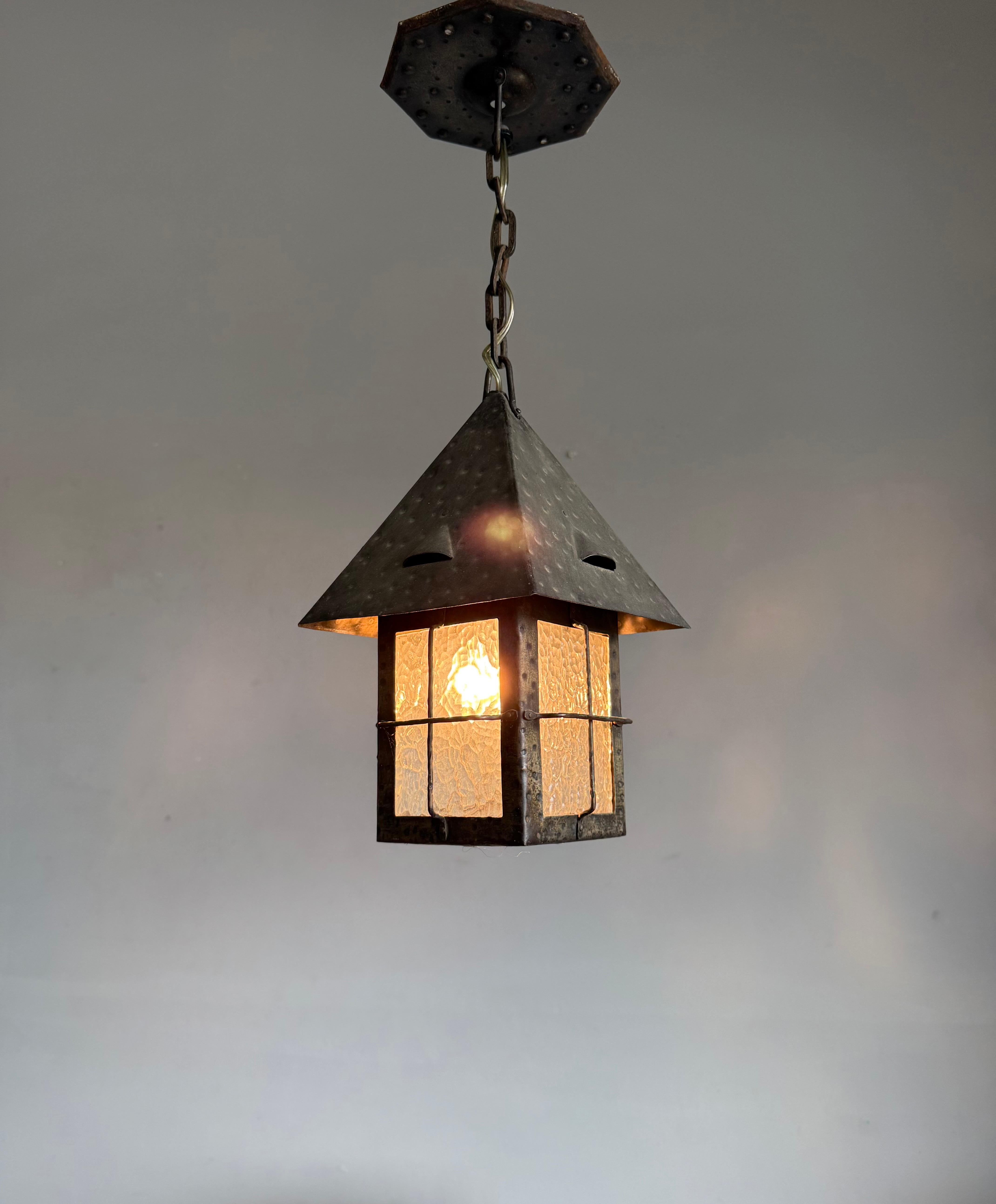 Hammered Antique Dutch Arts & Crafts Wrought Iron Pendant with Cathedral Glass, ca. 1910 For Sale