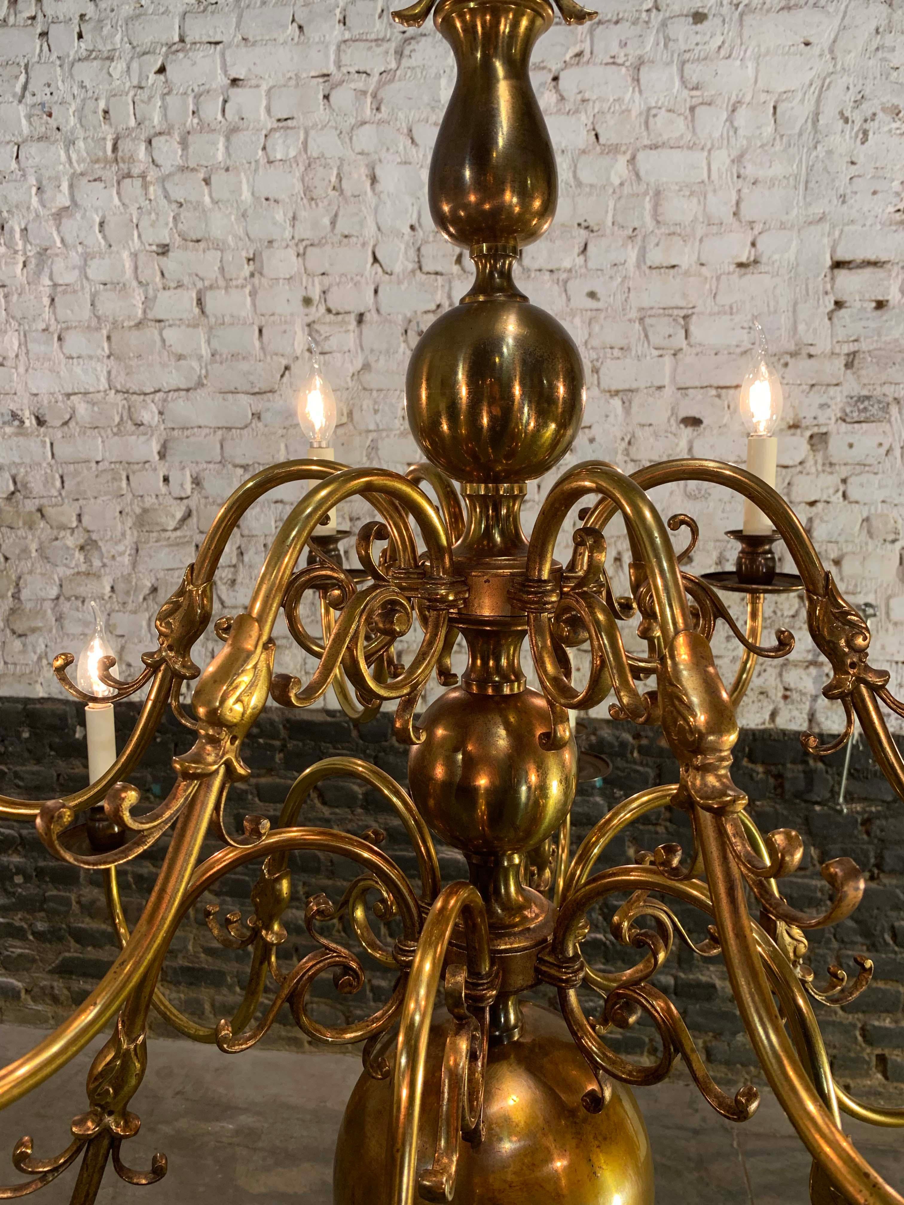 Baroque Revival Antique Dutch Brass Two-Tier Twelve-Light Bulbous and Scrolled Chandelier