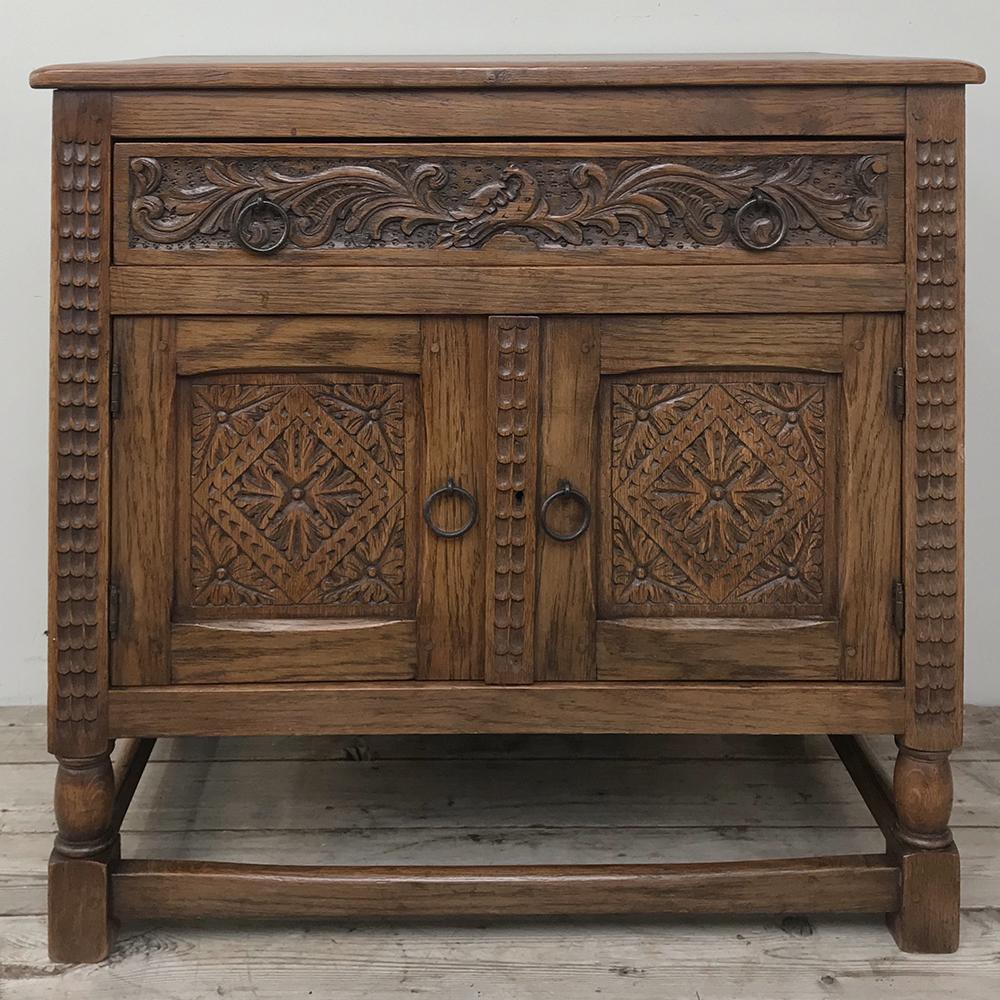 Antique Dutch cabinet ~ end table ~ nightstand is a versatile little cabinet with nice hand carved embellishment on the two cabinet doors and full width drawer. Handcrafted from solid oak, it's a great choice for any room,
circa early