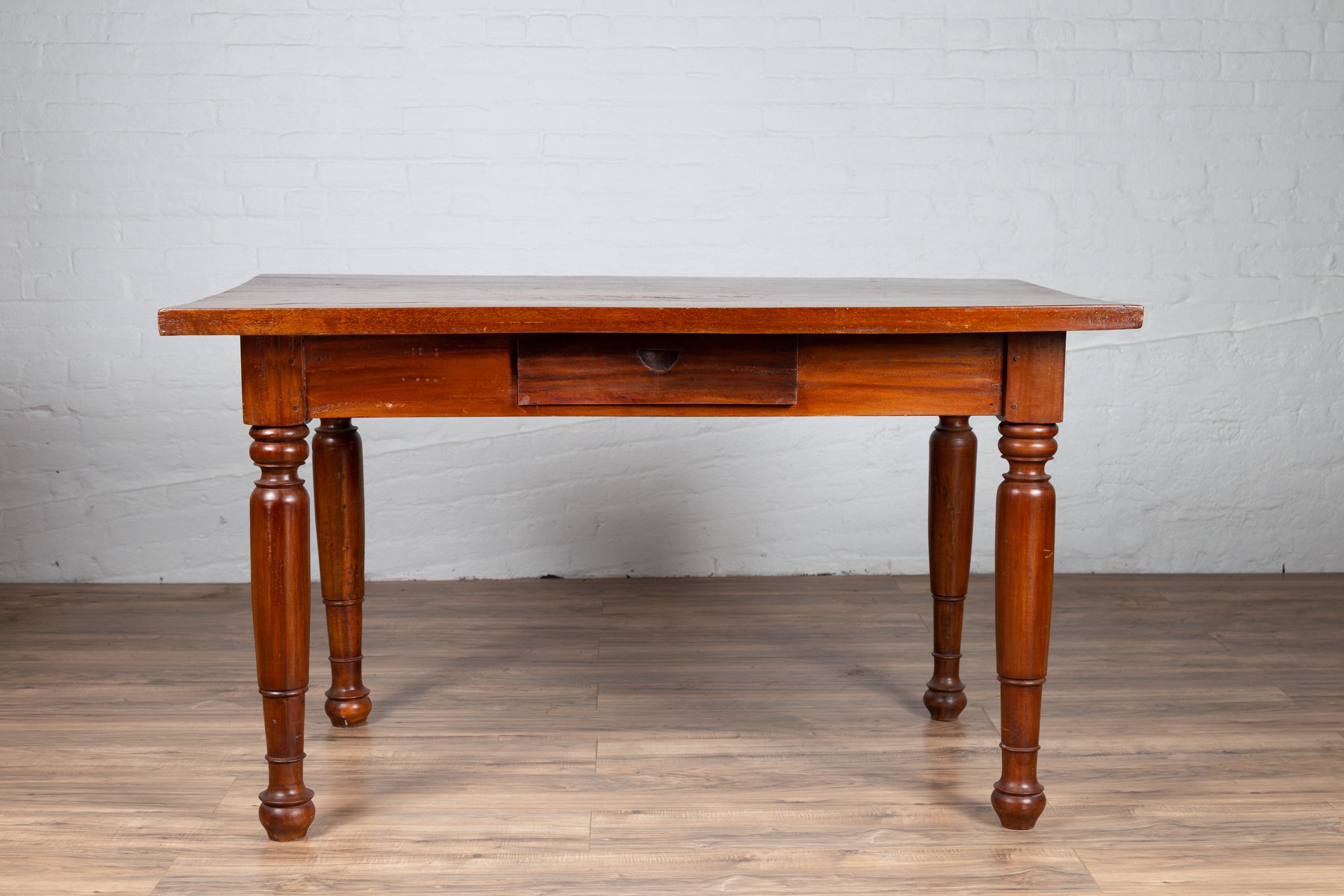 20th Century Antique Dutch Colonial Javanese Teak Desk with Single Drawer and Turned Legs For Sale