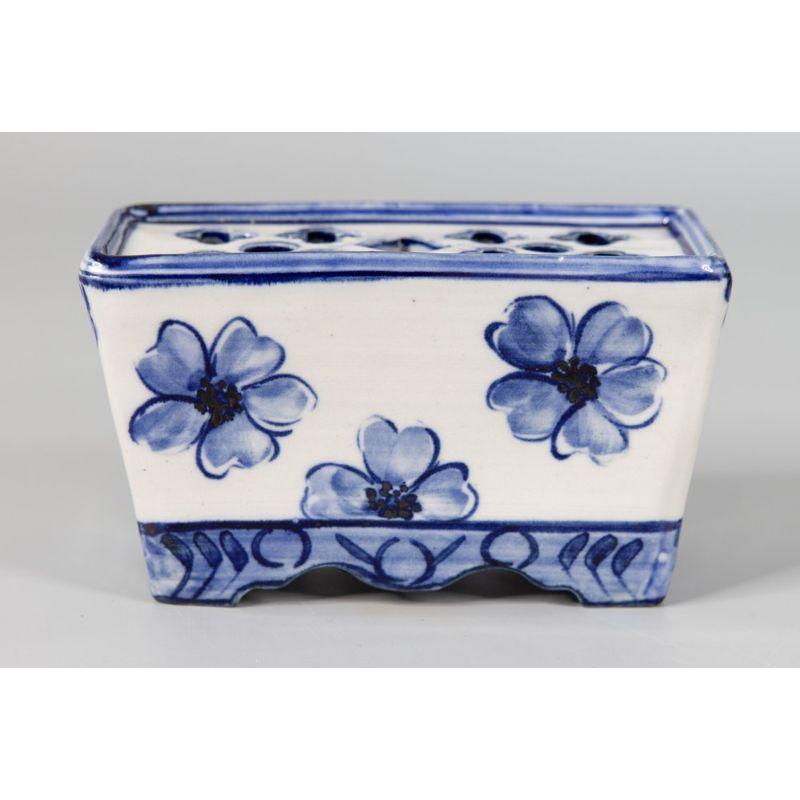 A fine early 20th-Century Dutch Delft faience hand molded flower brick or tulipiere vase. This charming flower brick is a nice large size with a hand painted floral design in the traditional Delft colors of cobalt blue and white. It would be lovely